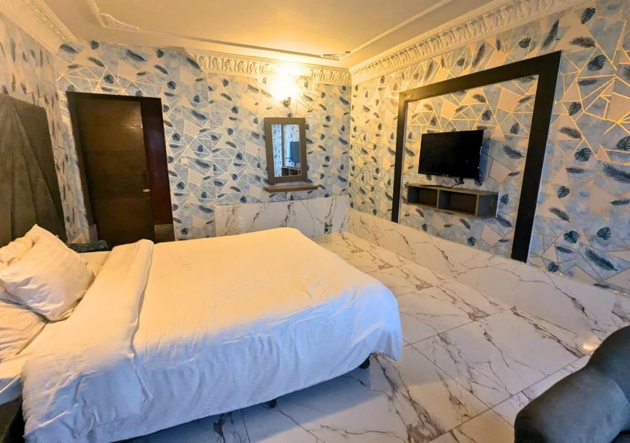 Bed in Grand Heights Hotel