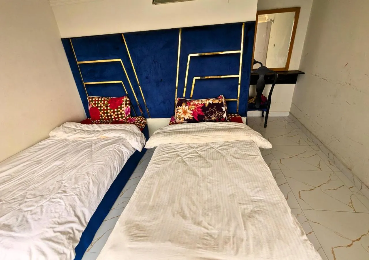 Bed in Grand Heights Hotel