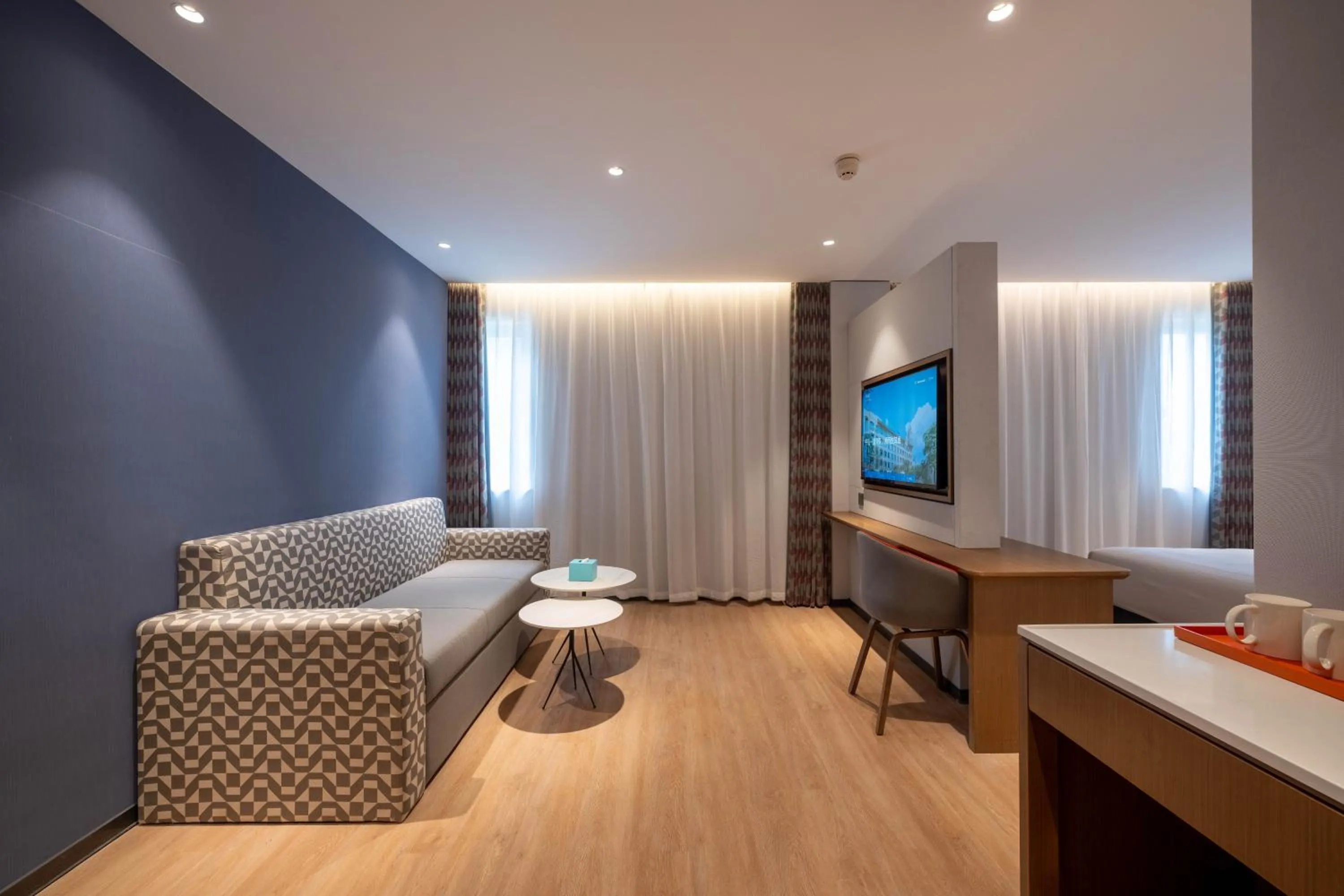 Living room in Holiday Inn Express Shanghai Pujiang Lianhang Road by IHG