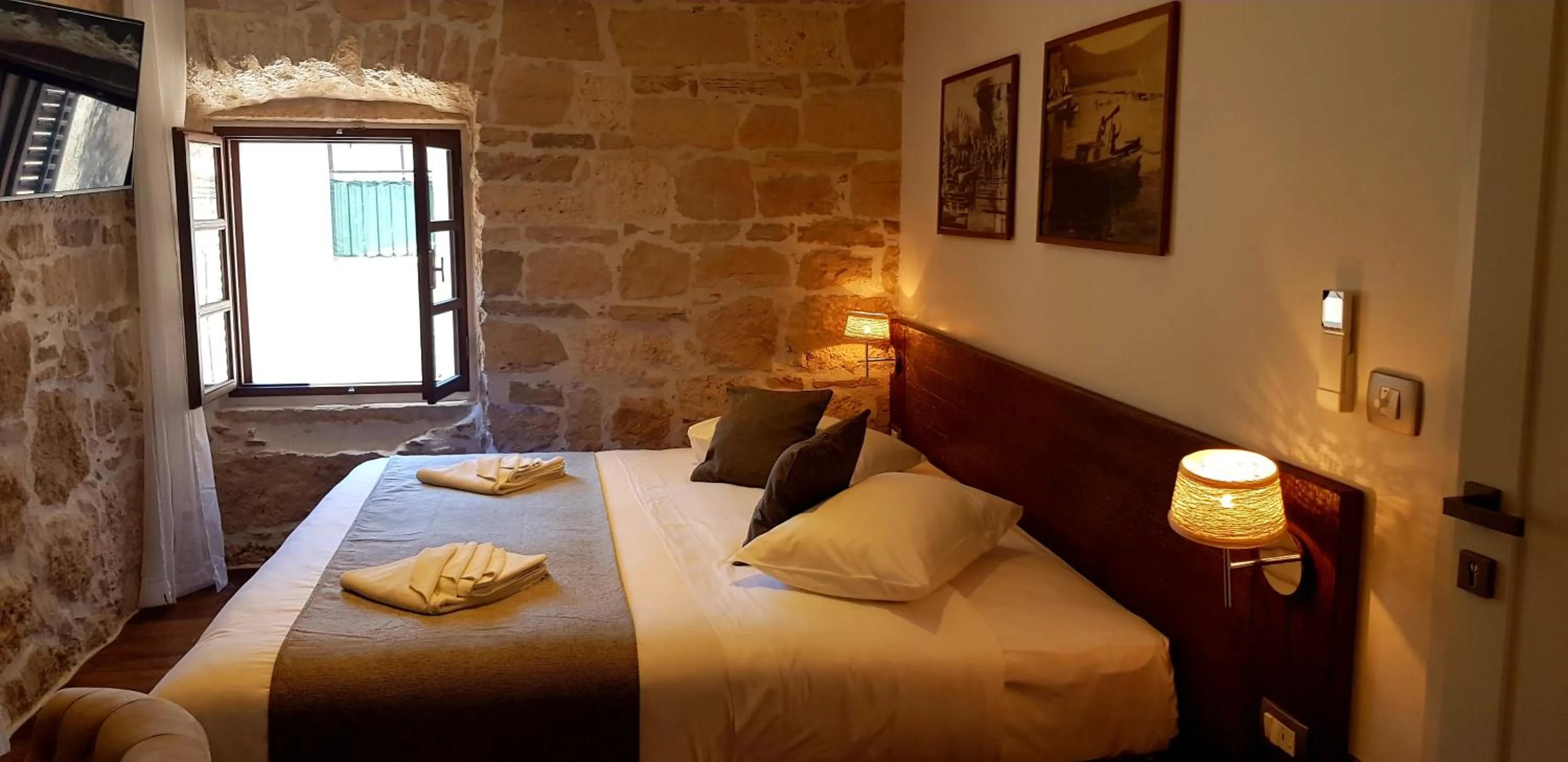 Photo of the whole room, Bed in San Teodoro