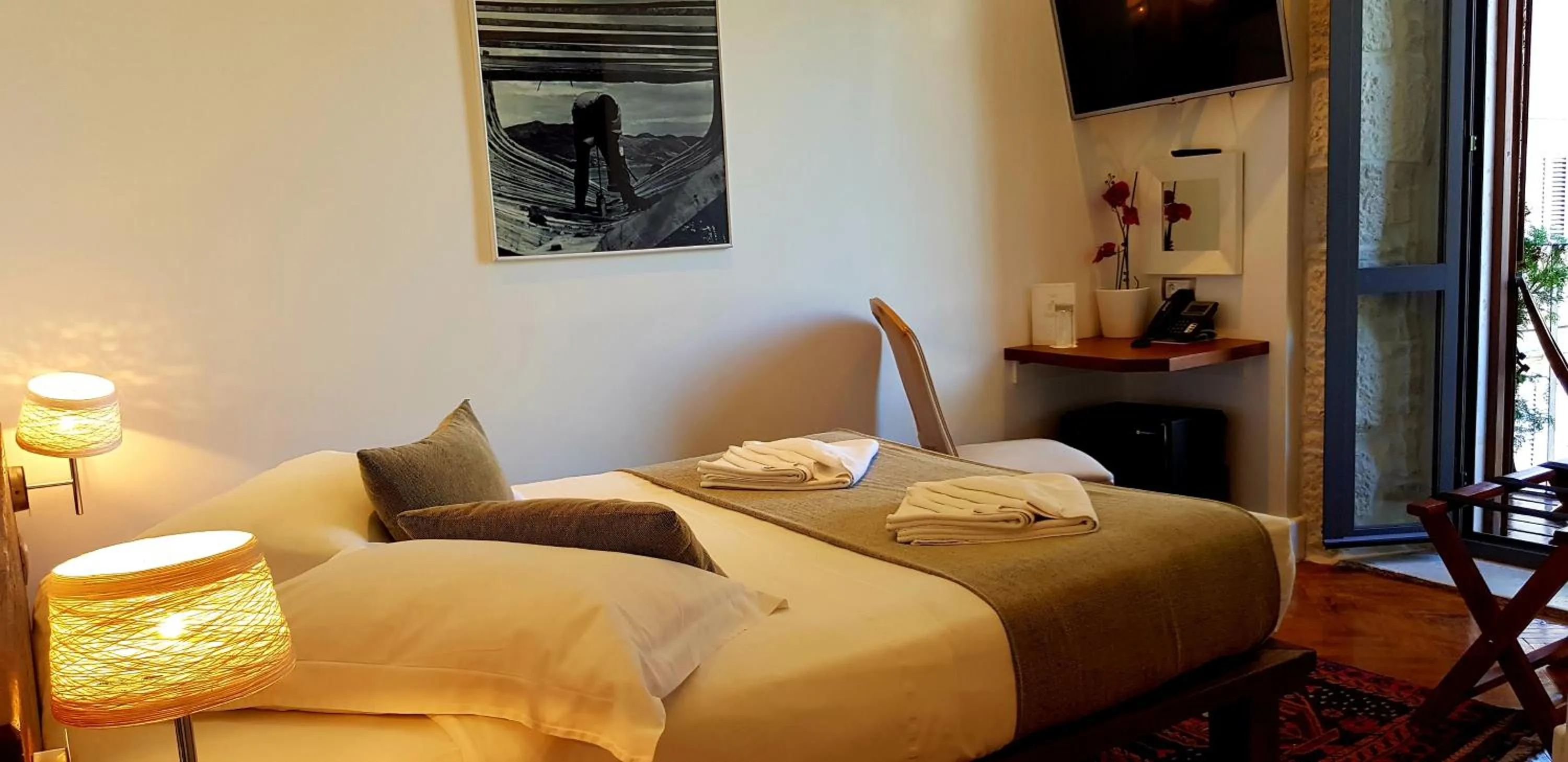 Photo of the whole room, Bed in San Teodoro