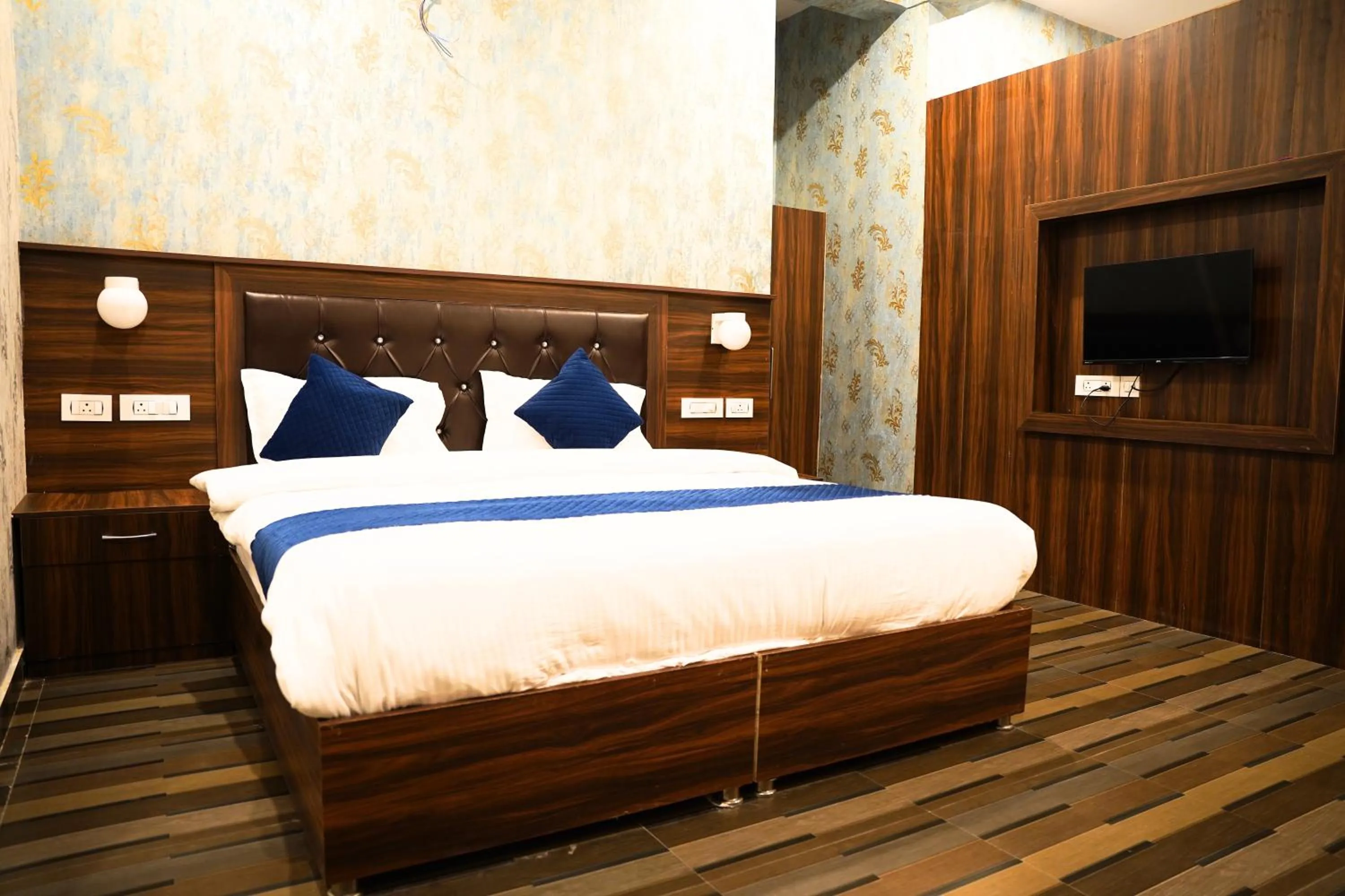 Bedroom in Hotel HSR Residency