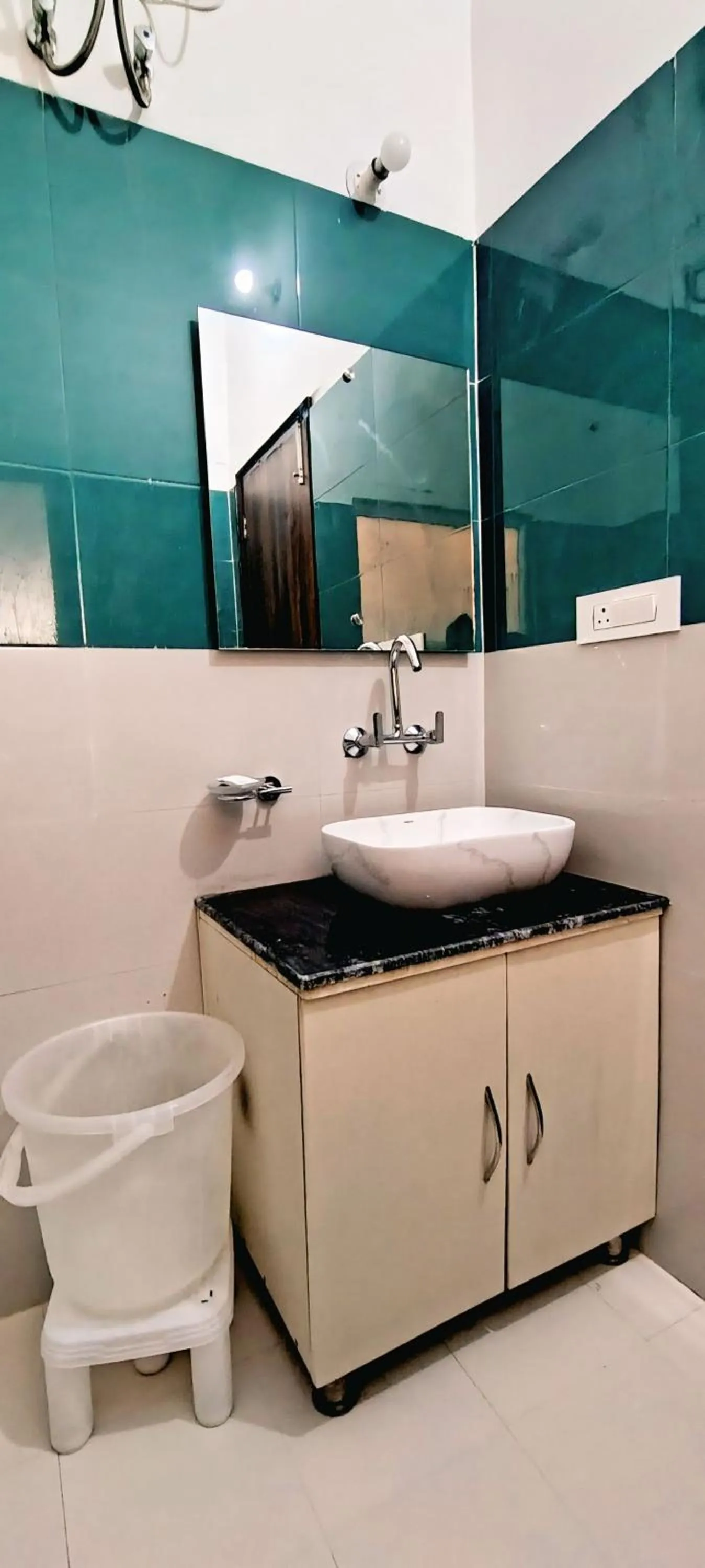 Bathroom in Hotel HSR Residency