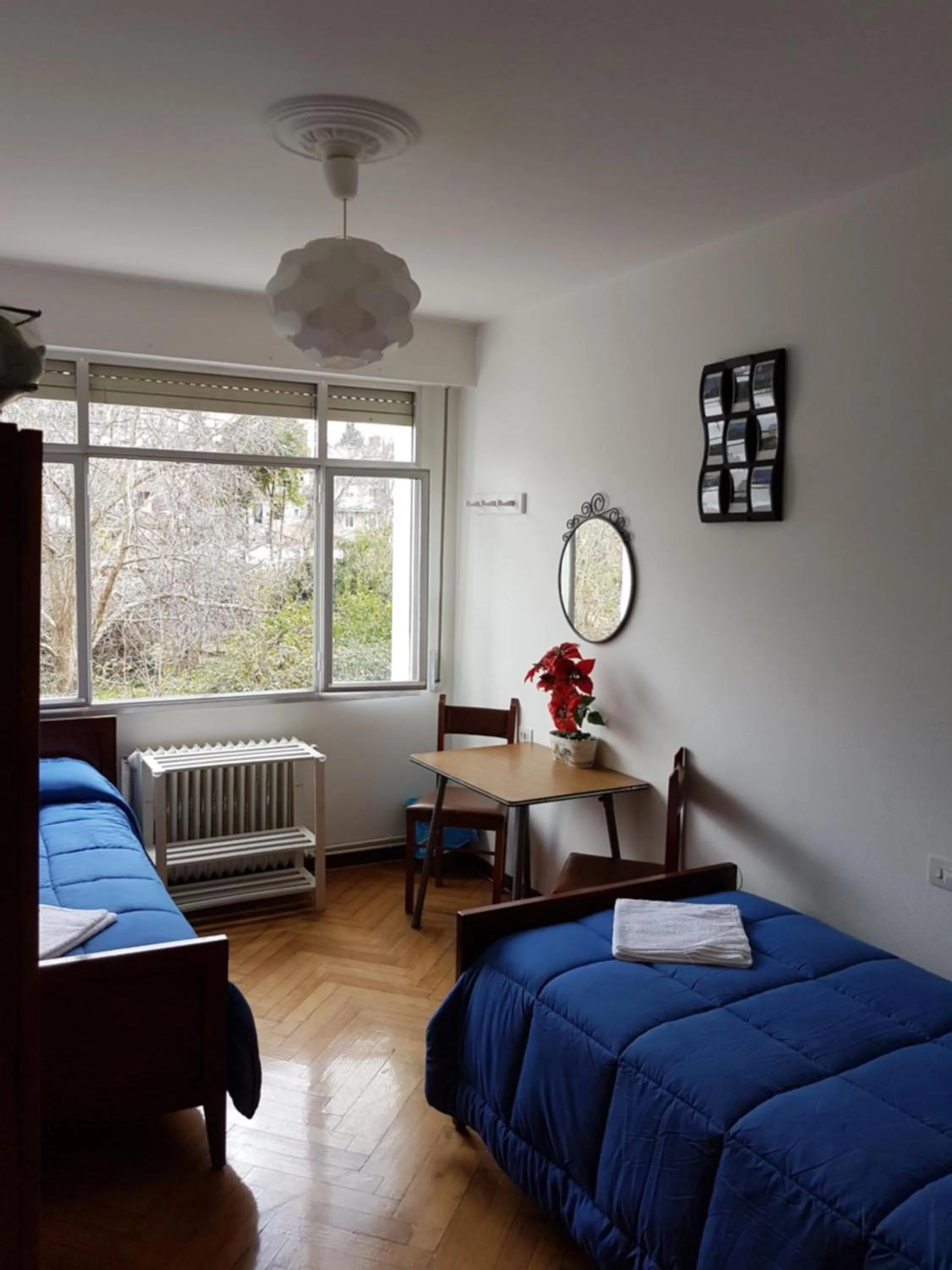 Photo of the whole room, Bed in Hostal Costa Azul