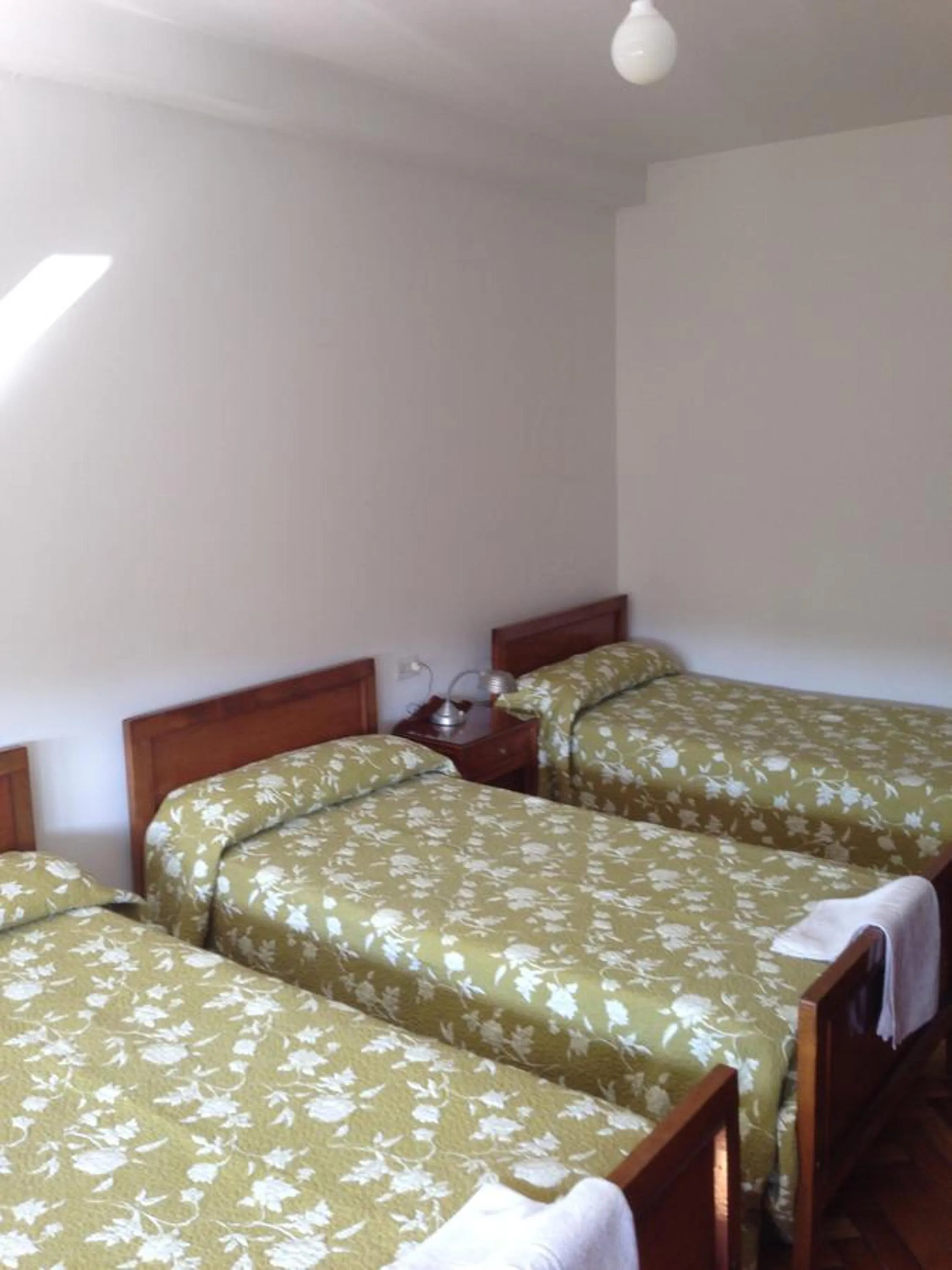 Photo of the whole room, Bed in Hostal Costa Azul