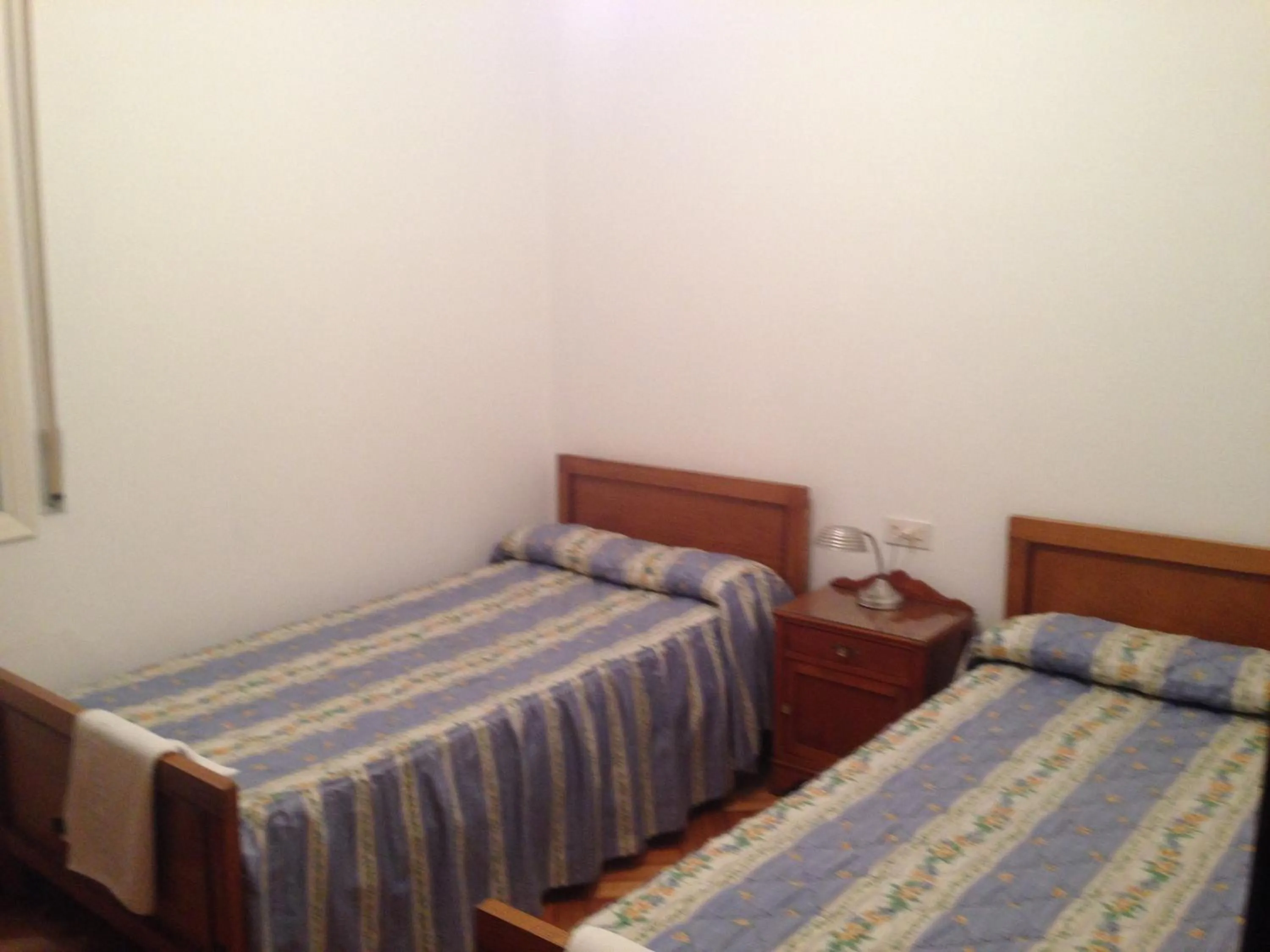 Photo of the whole room, Bed in Hostal Costa Azul
