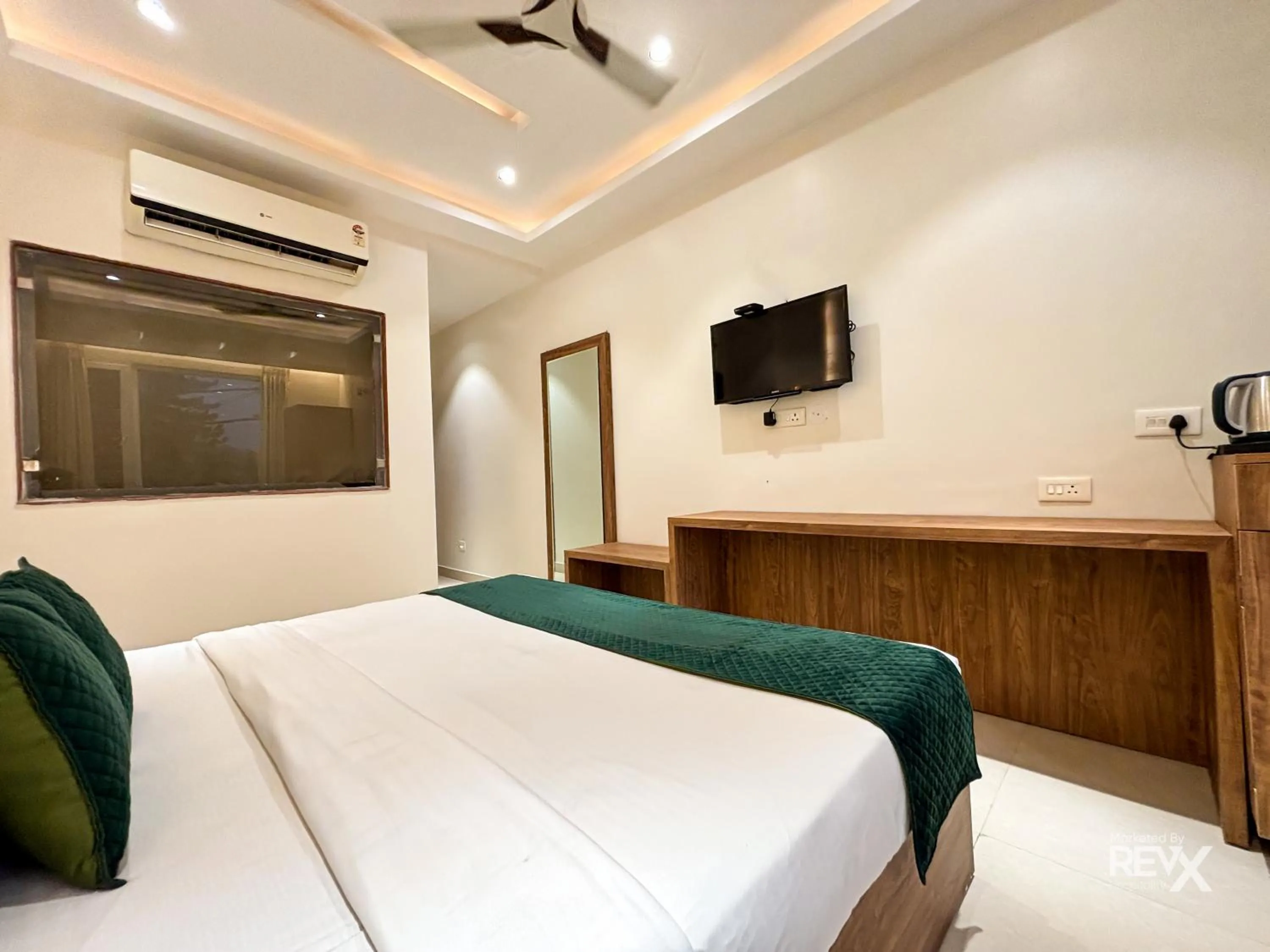 Bed in Green View by Green Tree Hotels