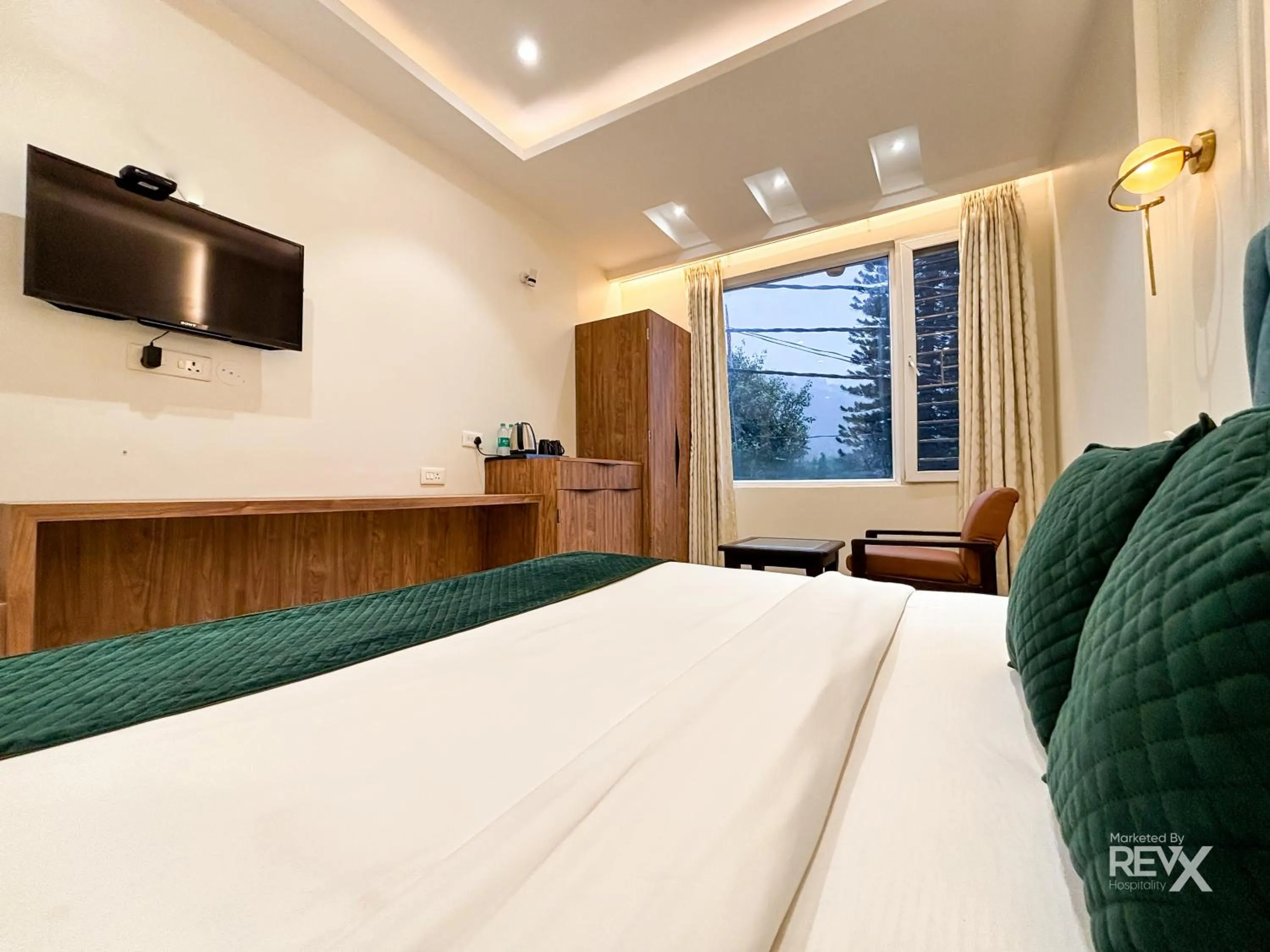 Bed in Green View by Green Tree Hotels