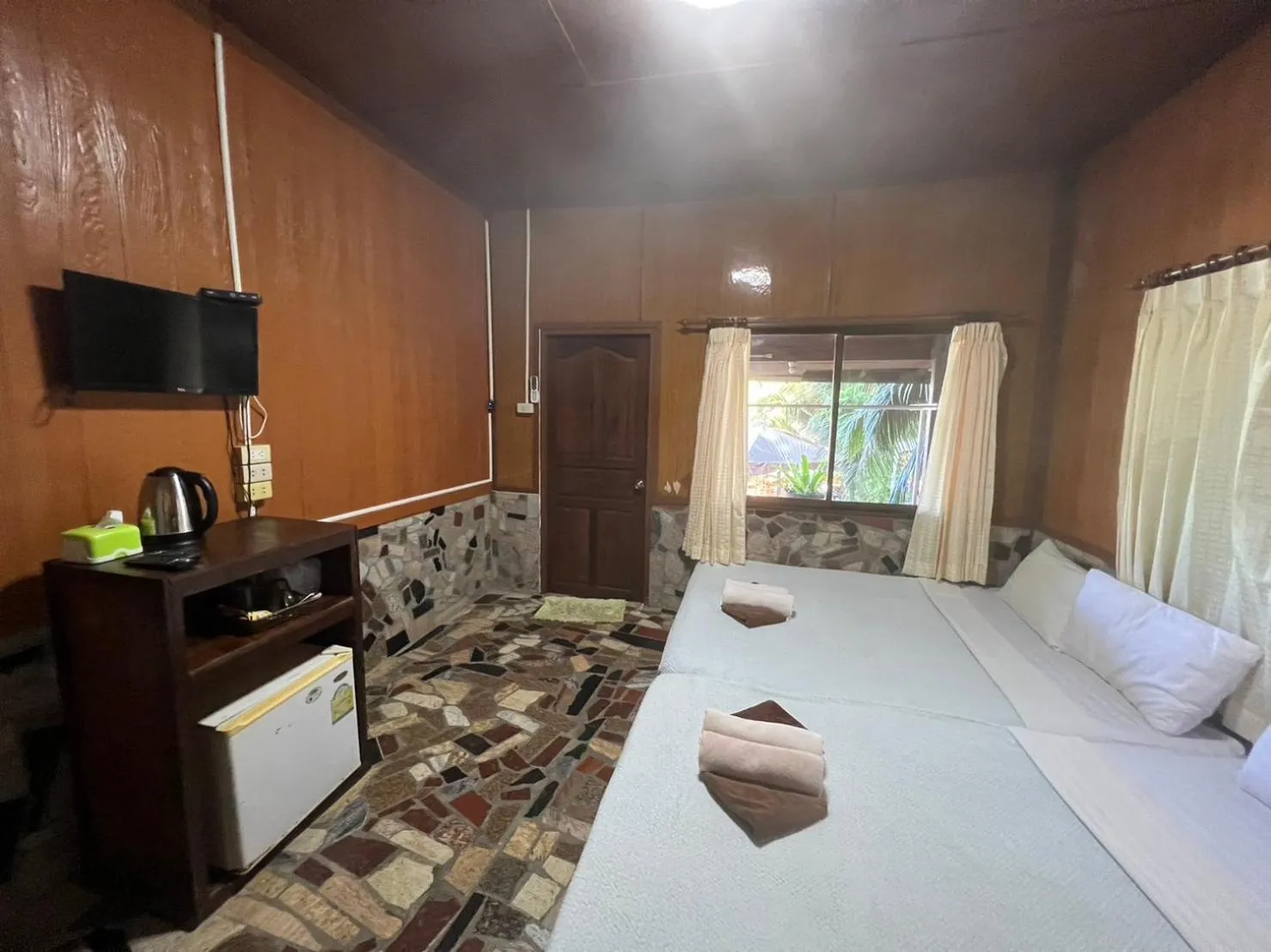 Photo of the whole room, Bed in Tongta Phaview Resort