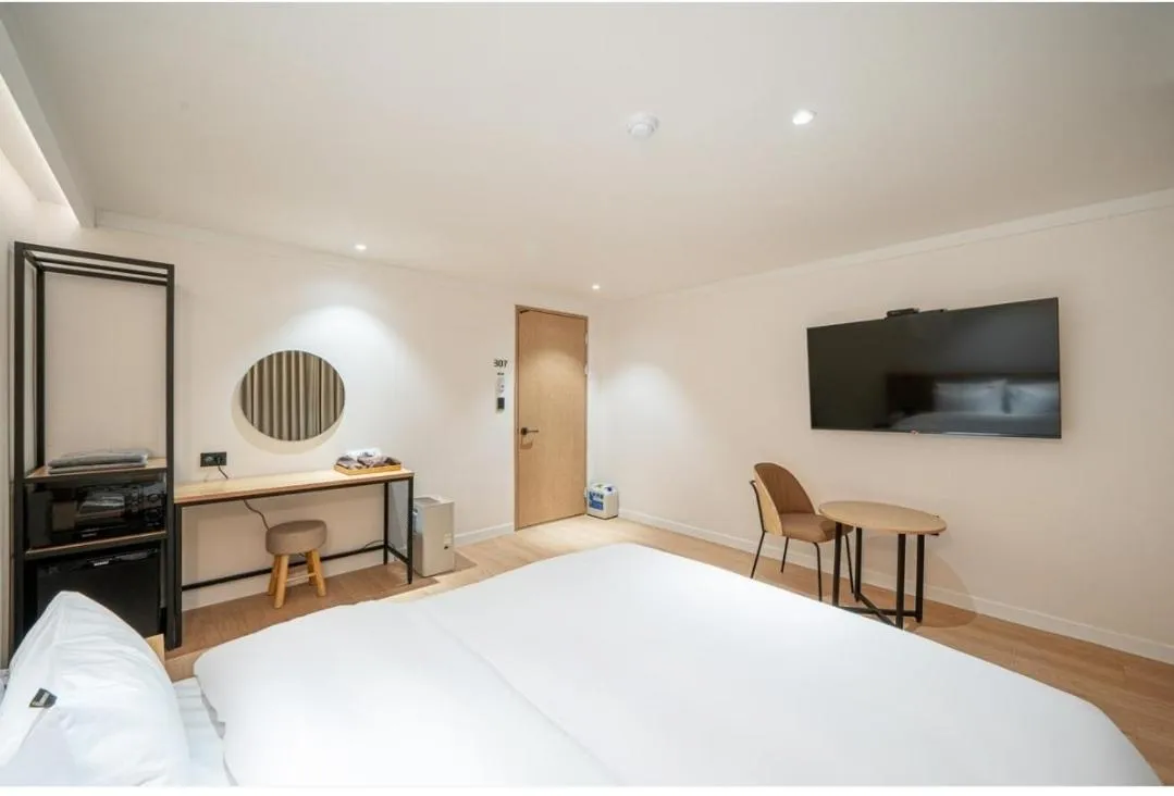 Bed in Brown Dot Hotel South Gumi