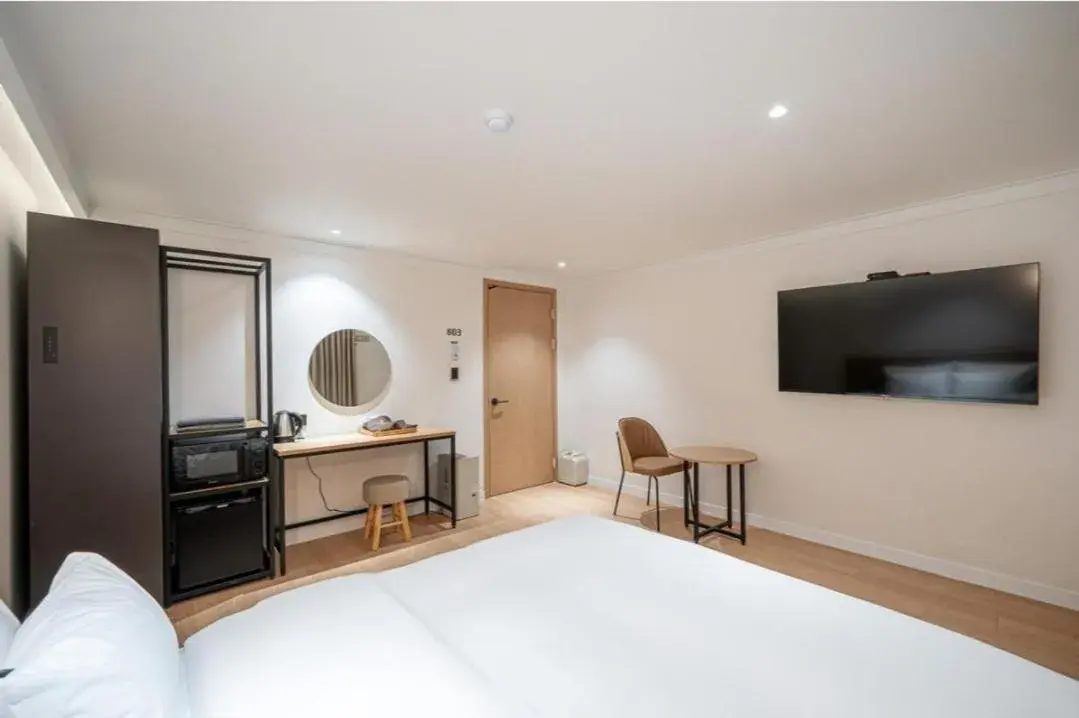 Bed in Brown Dot Hotel South Gumi Bed in Brown Dot Hotel South Gumi