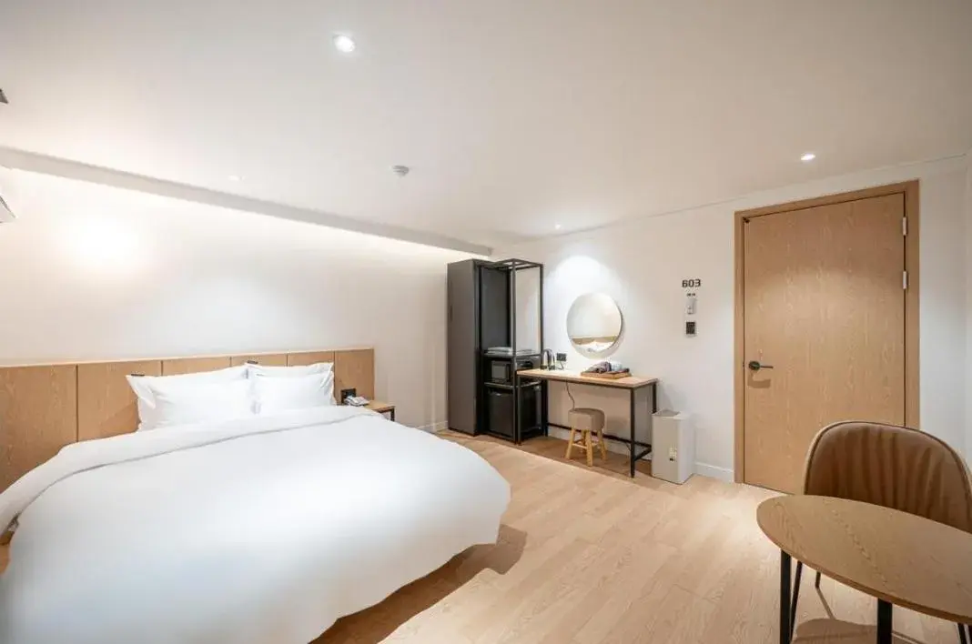 Bed in Brown Dot Hotel South Gumi Bed in Brown Dot Hotel South Gumi