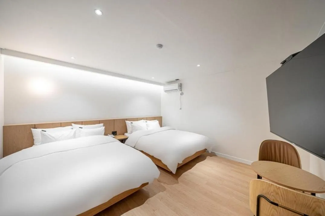 Bed in Brown Dot Hotel South Gumi