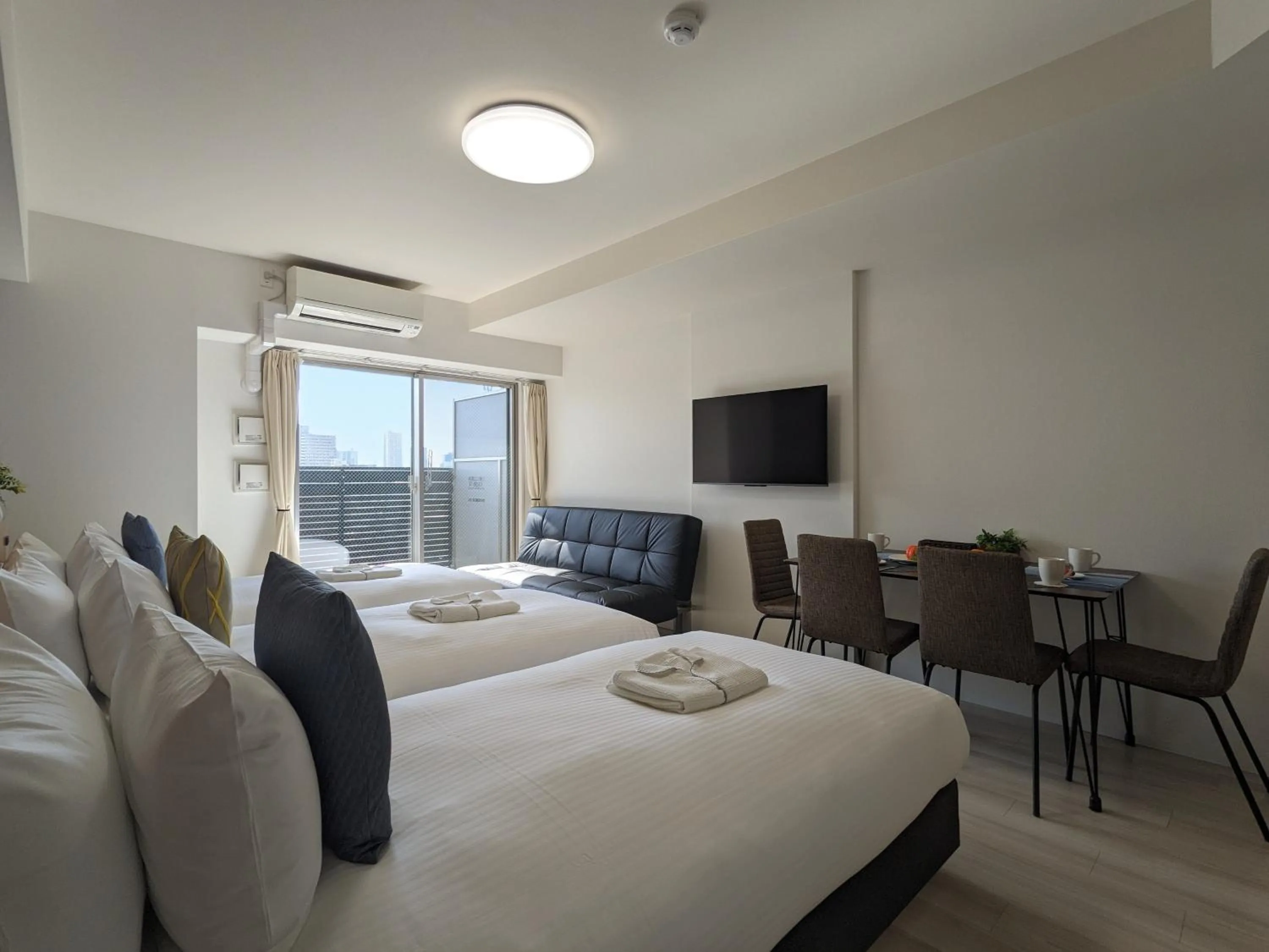 Bed in ESLEAD HOTEL Osaka Shinsaibashi