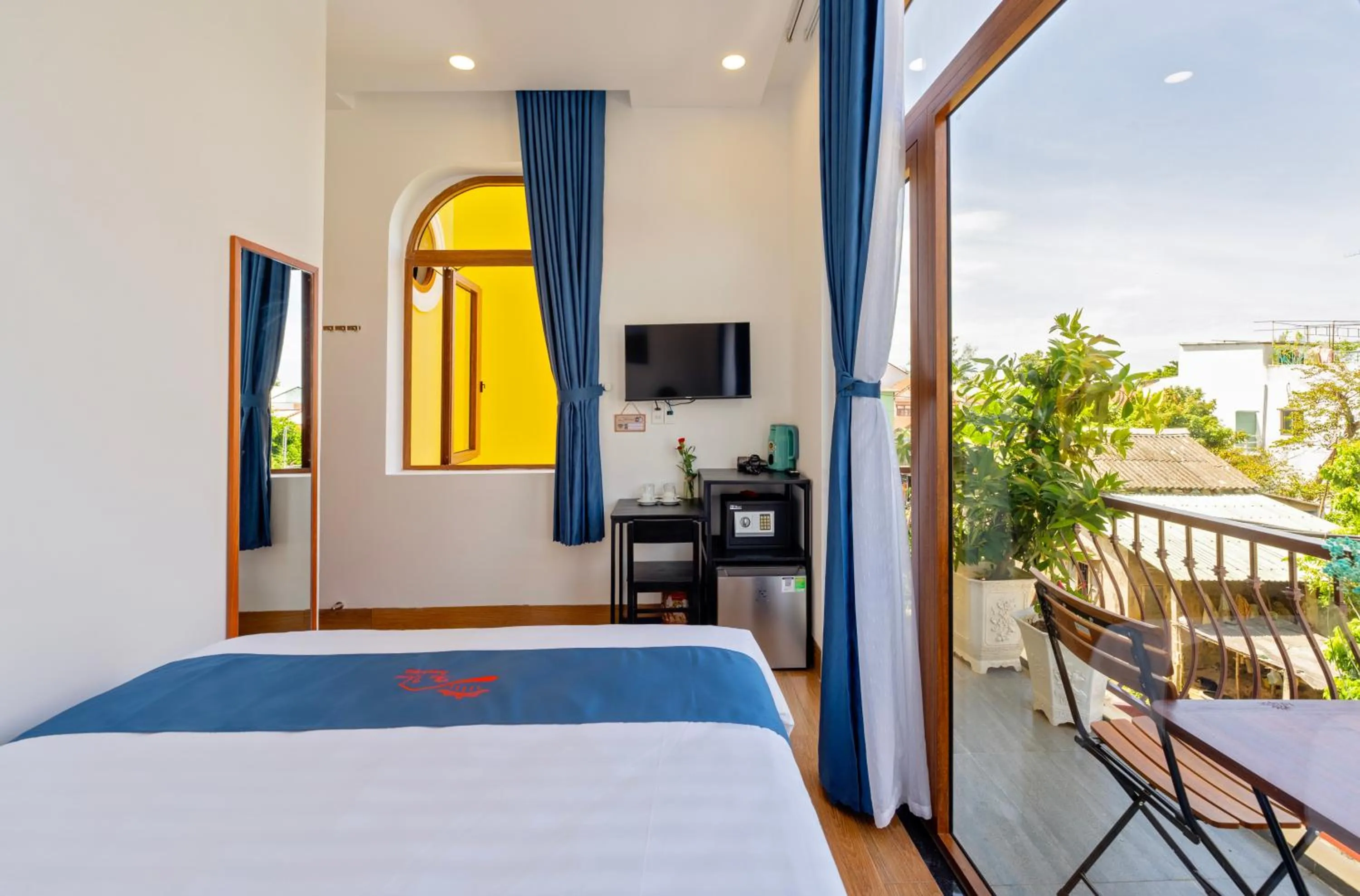Communal lounge/ TV room, Bed in The View Boutique Hoi An
