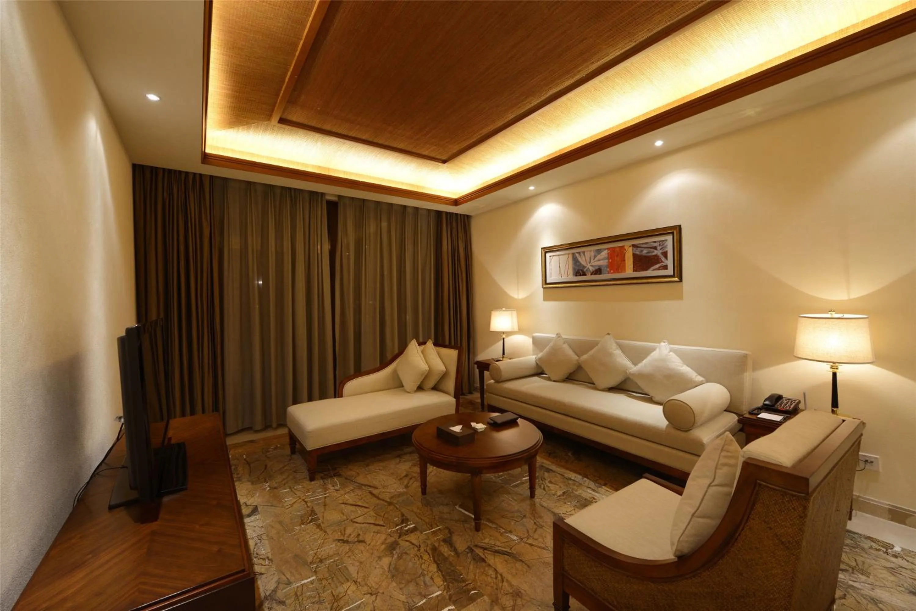 Communal lounge/ TV room in Stony Brook Villa Jianguo Resort Sanya
