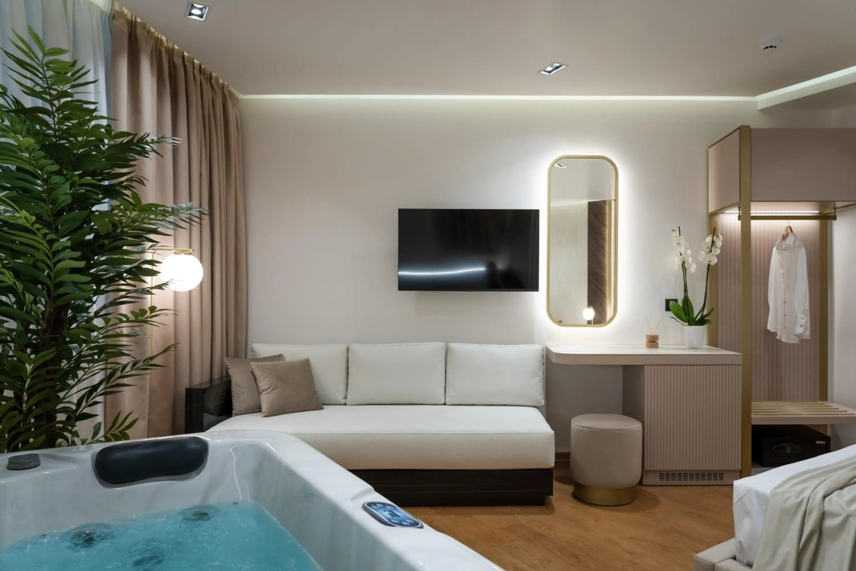 Living room, Bed in Aeolian Spirit Suites