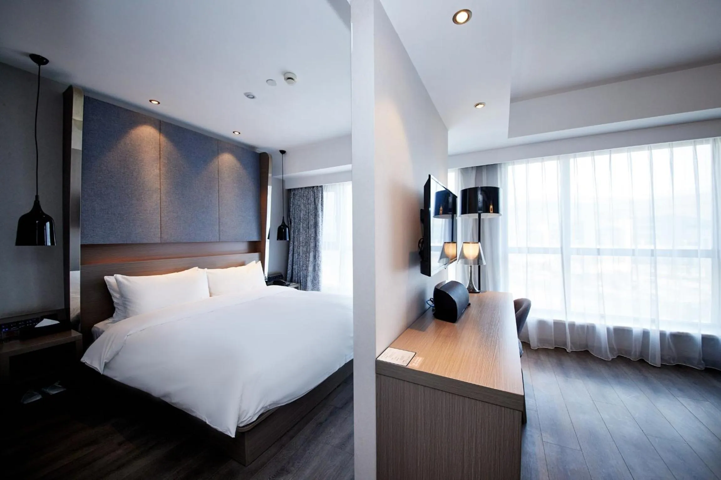Bedroom, Bed in Orange Hotel Shanghai Hongkou Football Stadium Branch