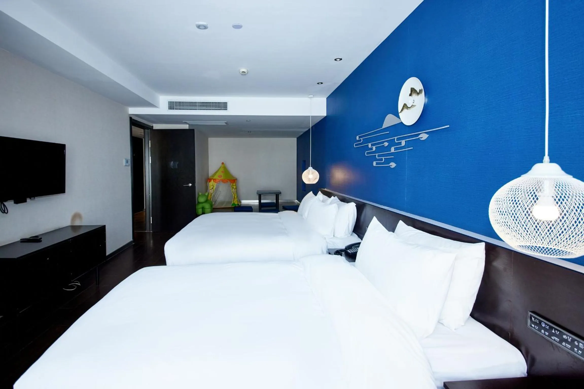Bedroom, Bed in Orange Hotel Shanghai Hongkou Football Stadium Branch