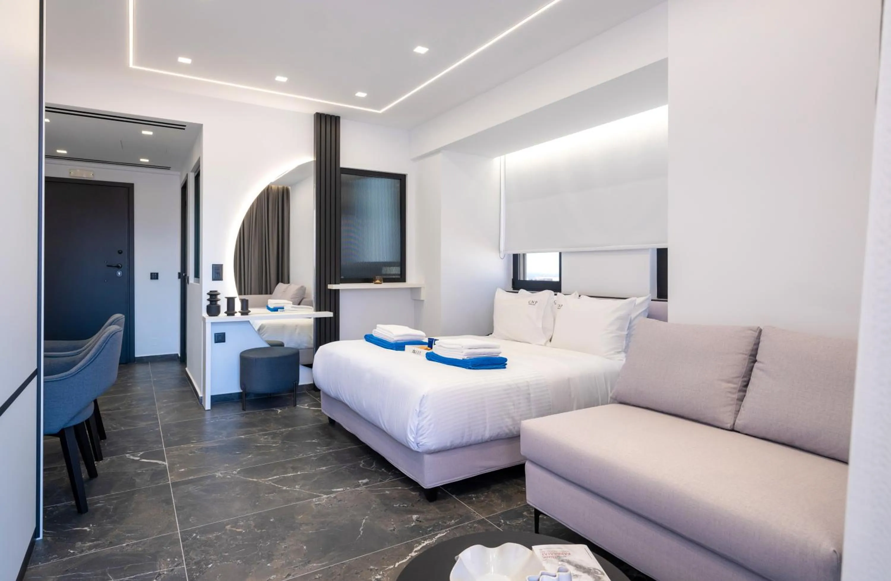 Bed in Captain Napoleon Paterakis CNP Luxurious Suites