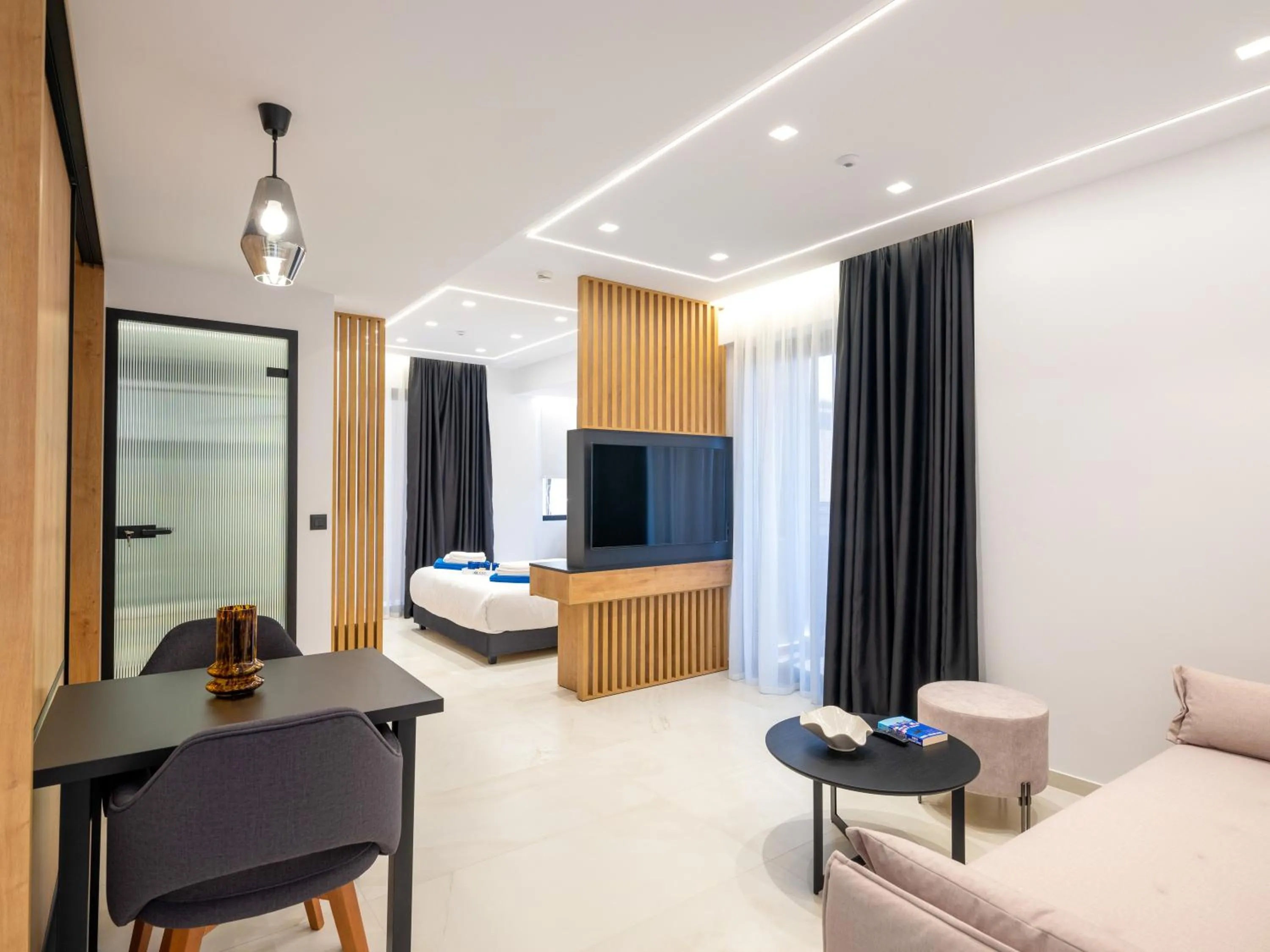 Bed in Captain Napoleon Paterakis CNP Luxurious Suites