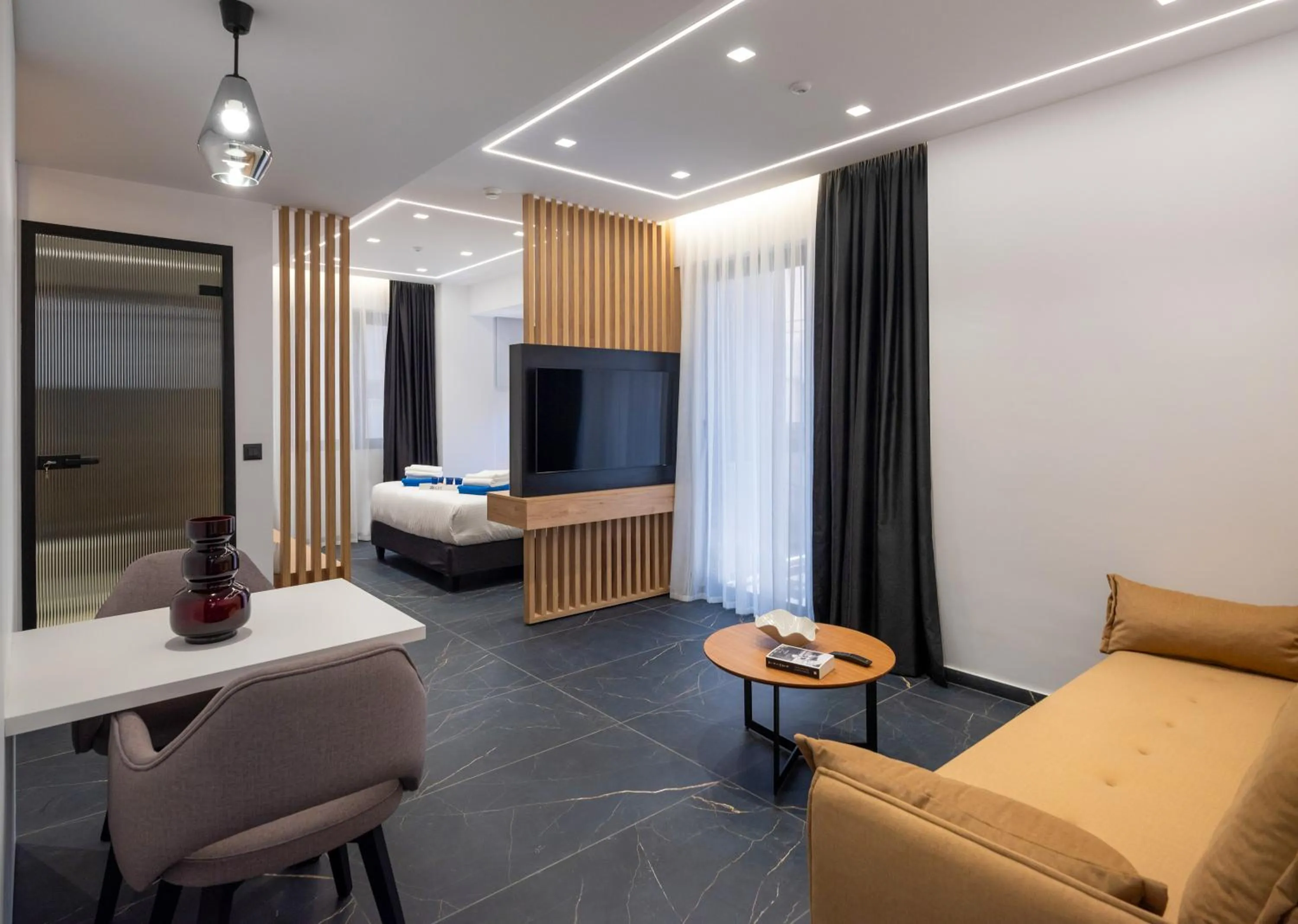 Bed in Captain Napoleon Paterakis CNP Luxurious Suites