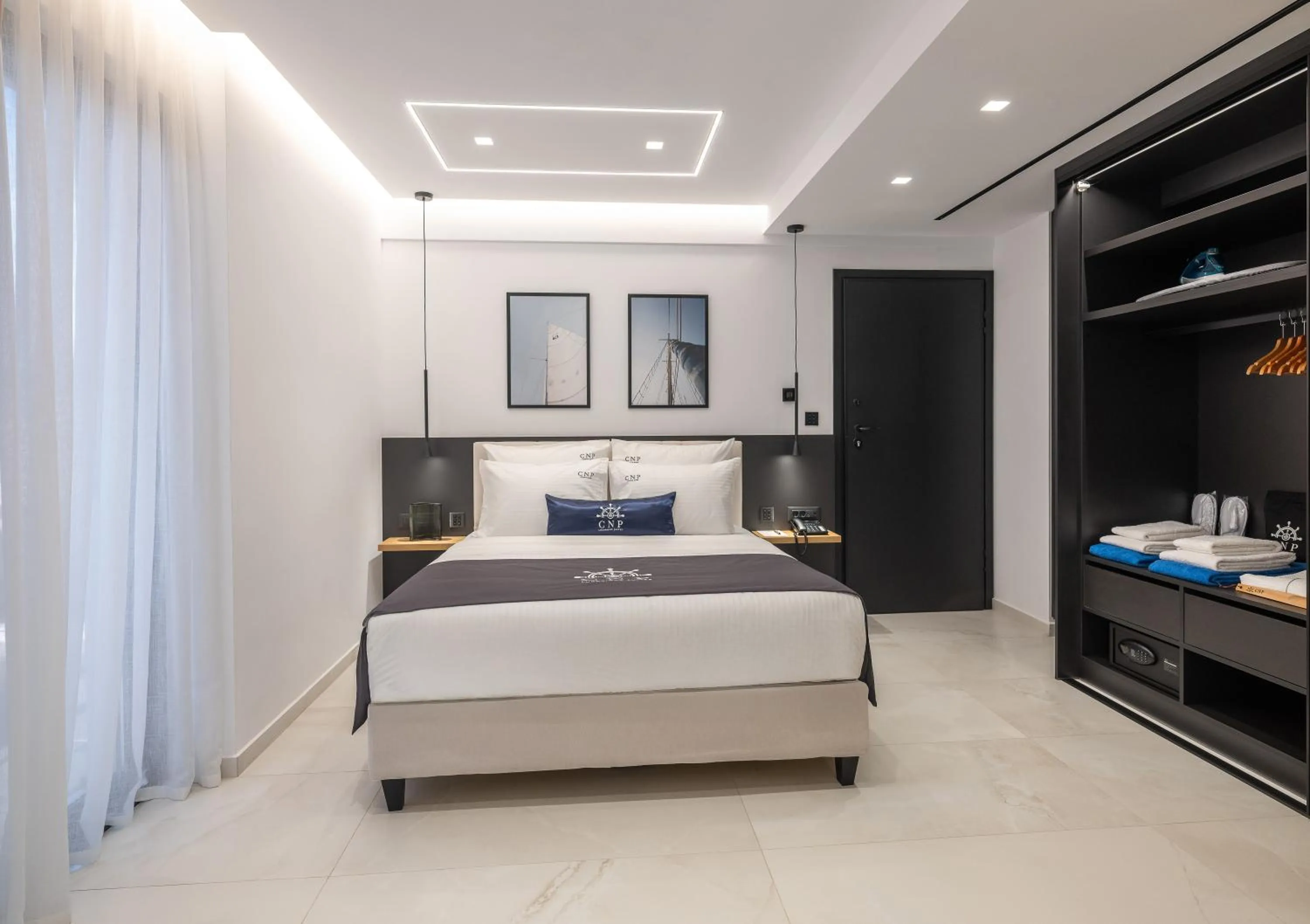 Bed in Captain Napoleon Paterakis CNP Luxurious Suites