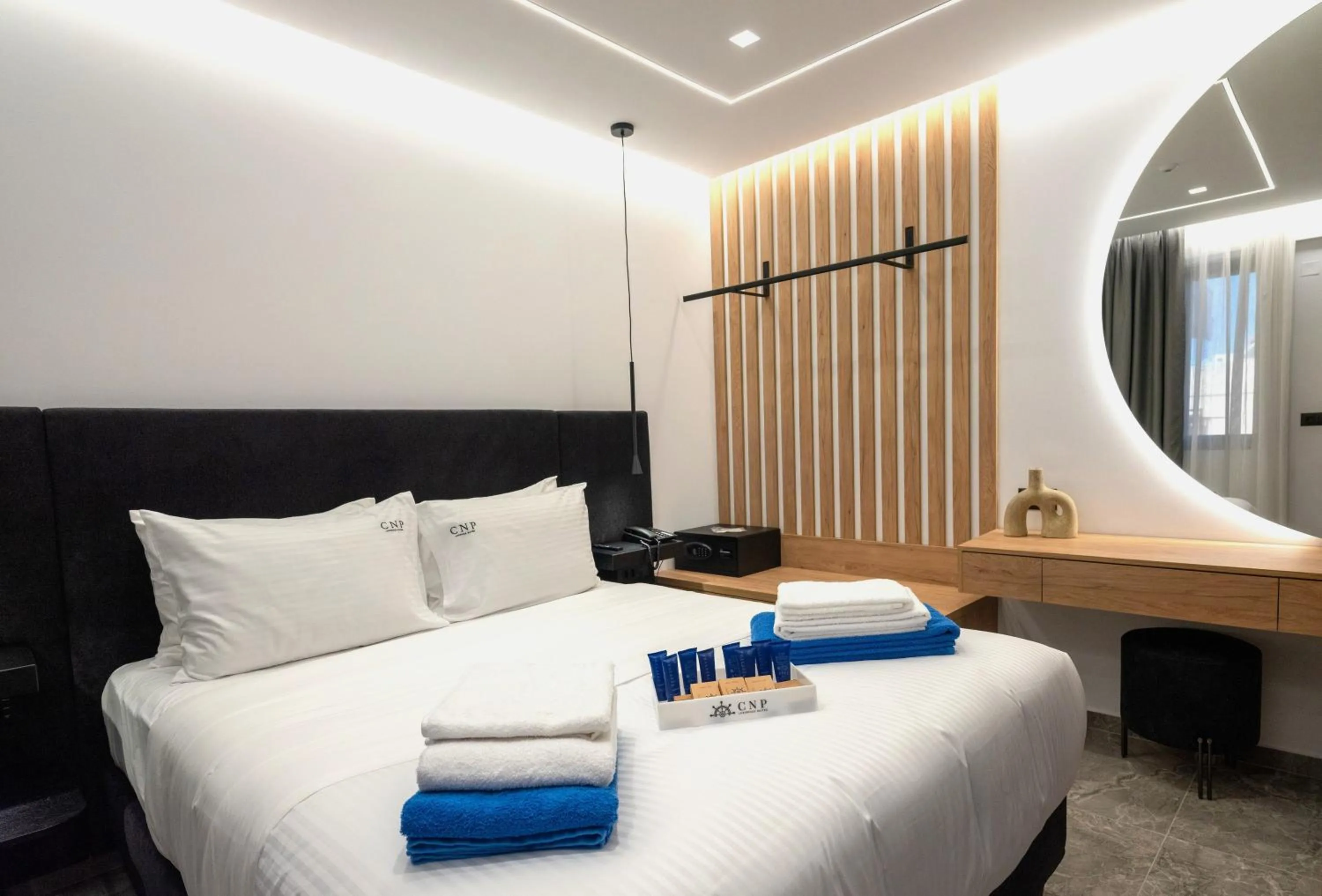 Bed in Captain Napoleon Paterakis CNP Luxurious Suites