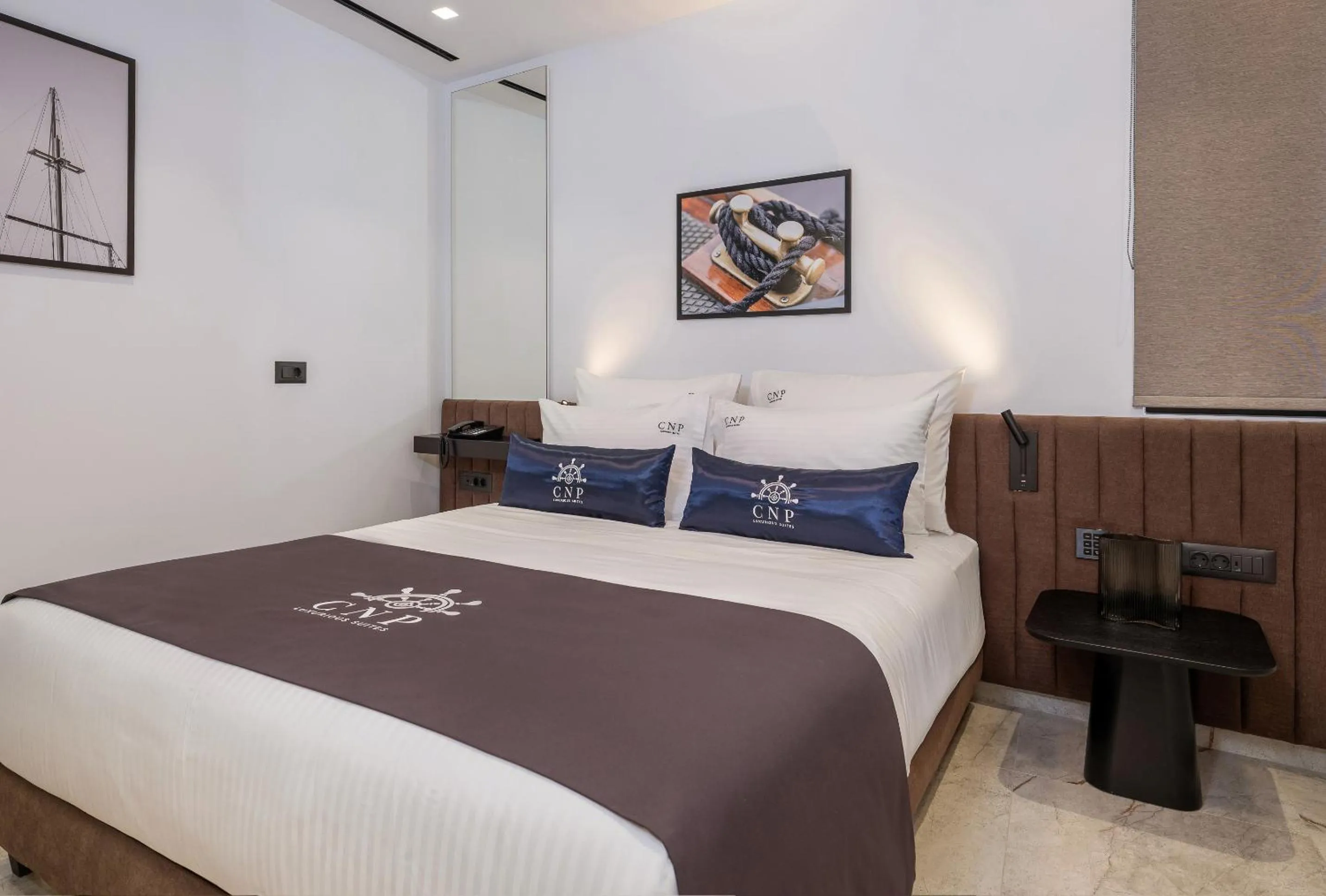 Bed in Captain Napoleon Paterakis CNP Luxurious Suites