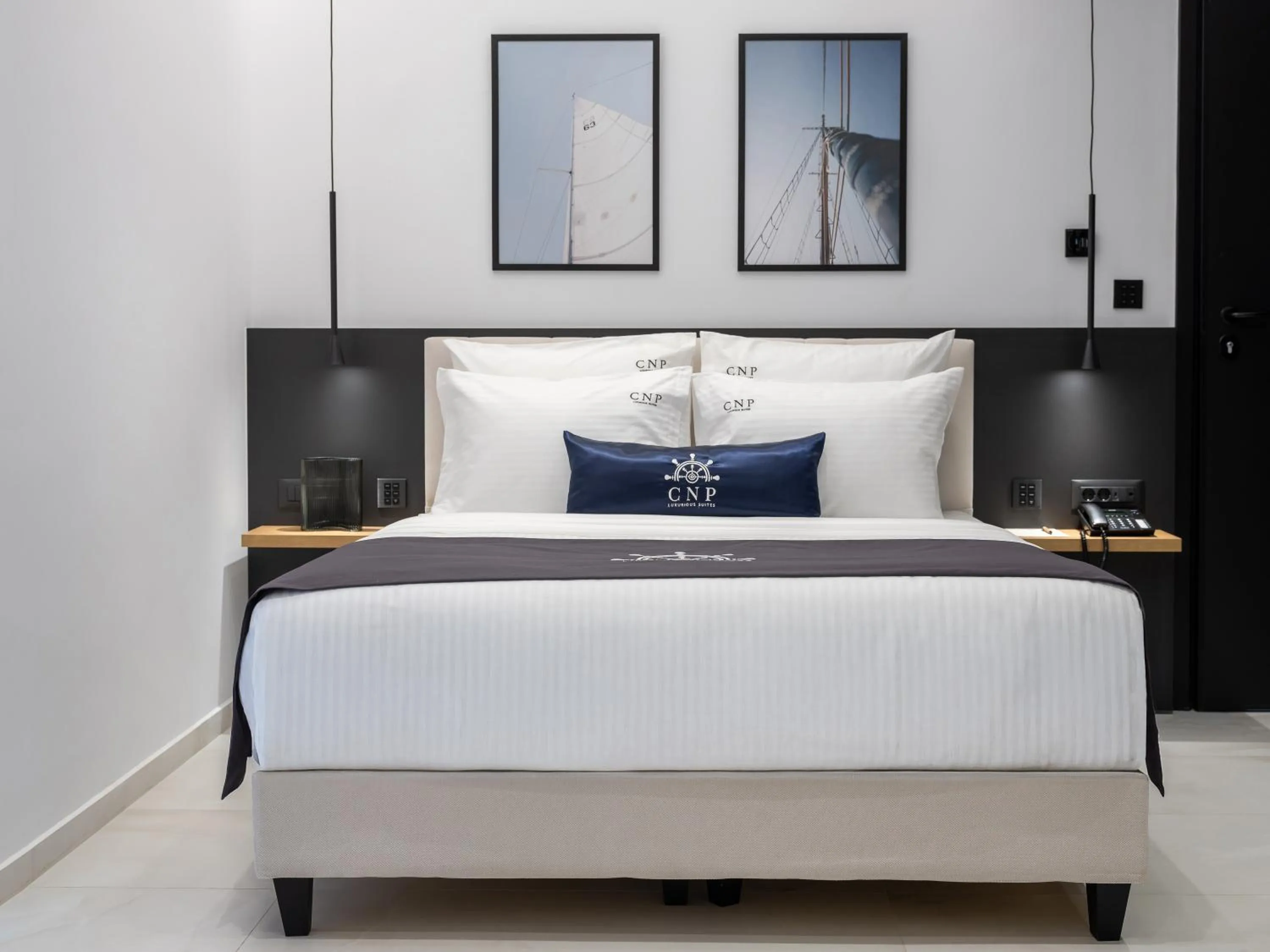 Bed in Captain Napoleon Paterakis CNP Luxurious Suites