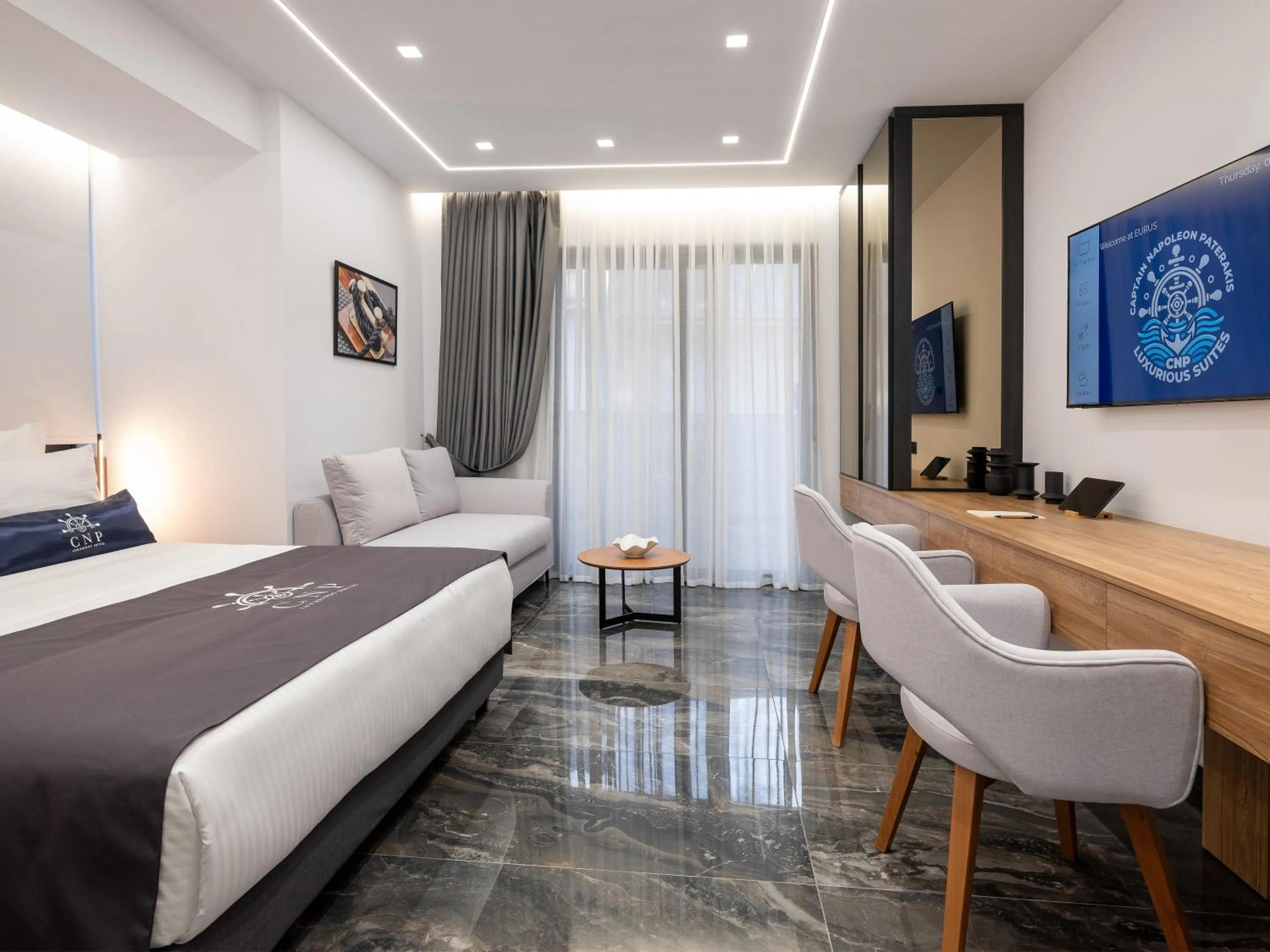 Bed in Captain Napoleon Paterakis CNP Luxurious Suites