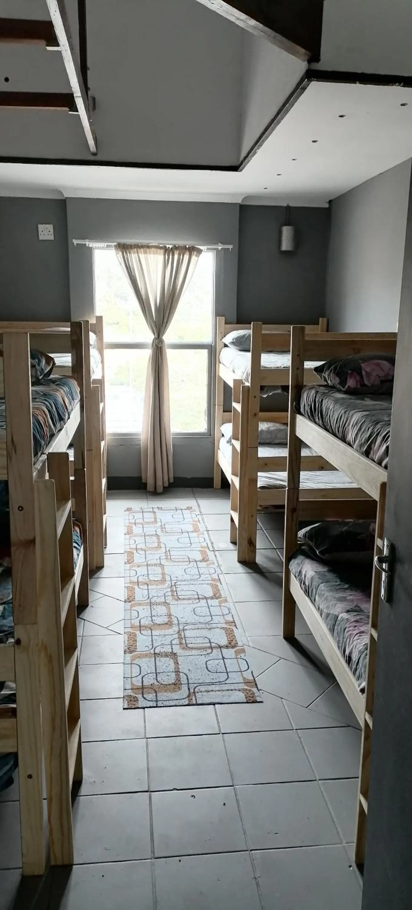 Bed in Mile Crunchers Backpackers & Hostelling