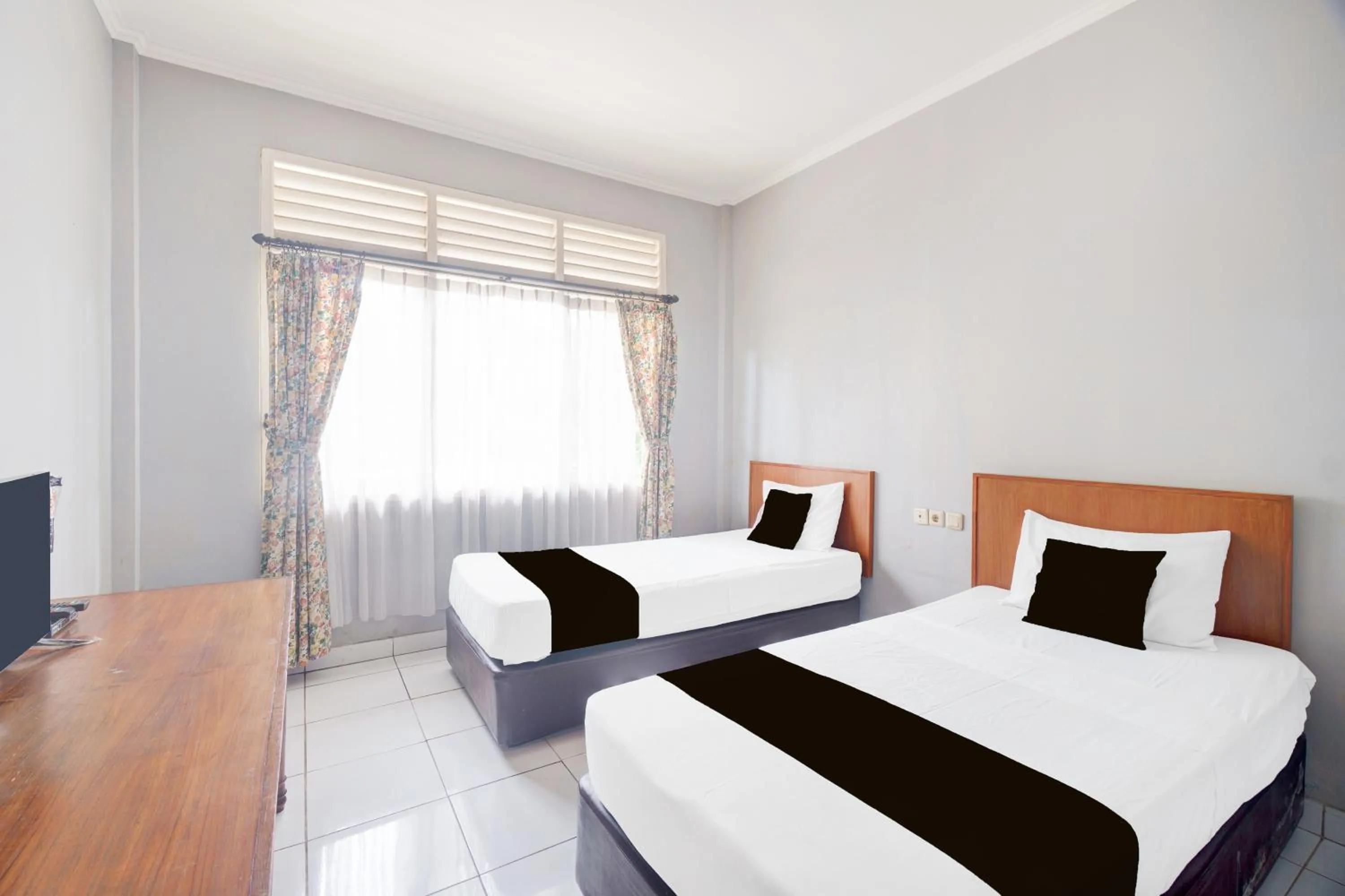 Photo of the whole room, Bed in Hotel O Bogor near Taman Safari formerly Hotel Rudian 1