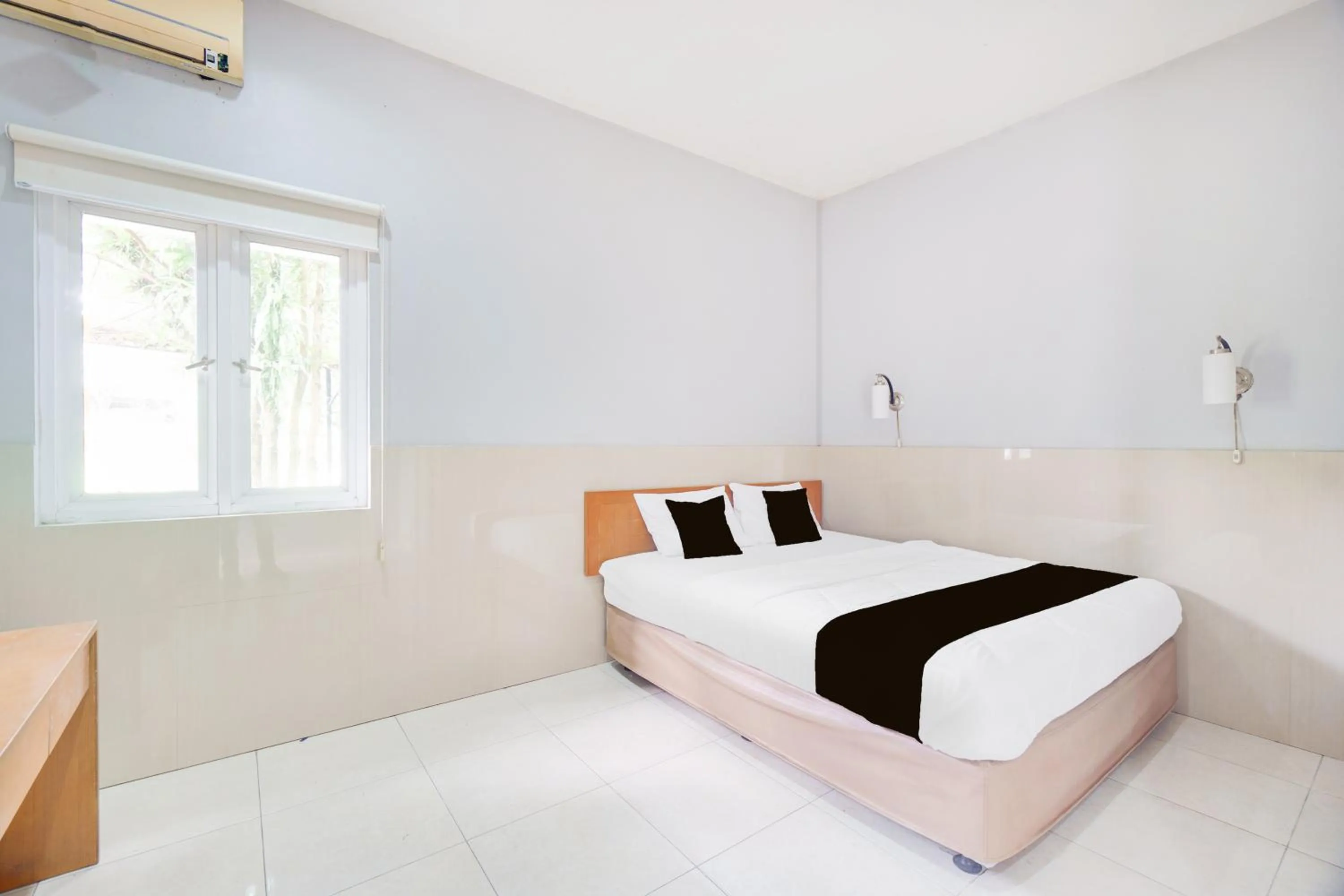 Photo of the whole room, Bed in Hotel O Bogor near Taman Safari formerly Hotel Rudian 2