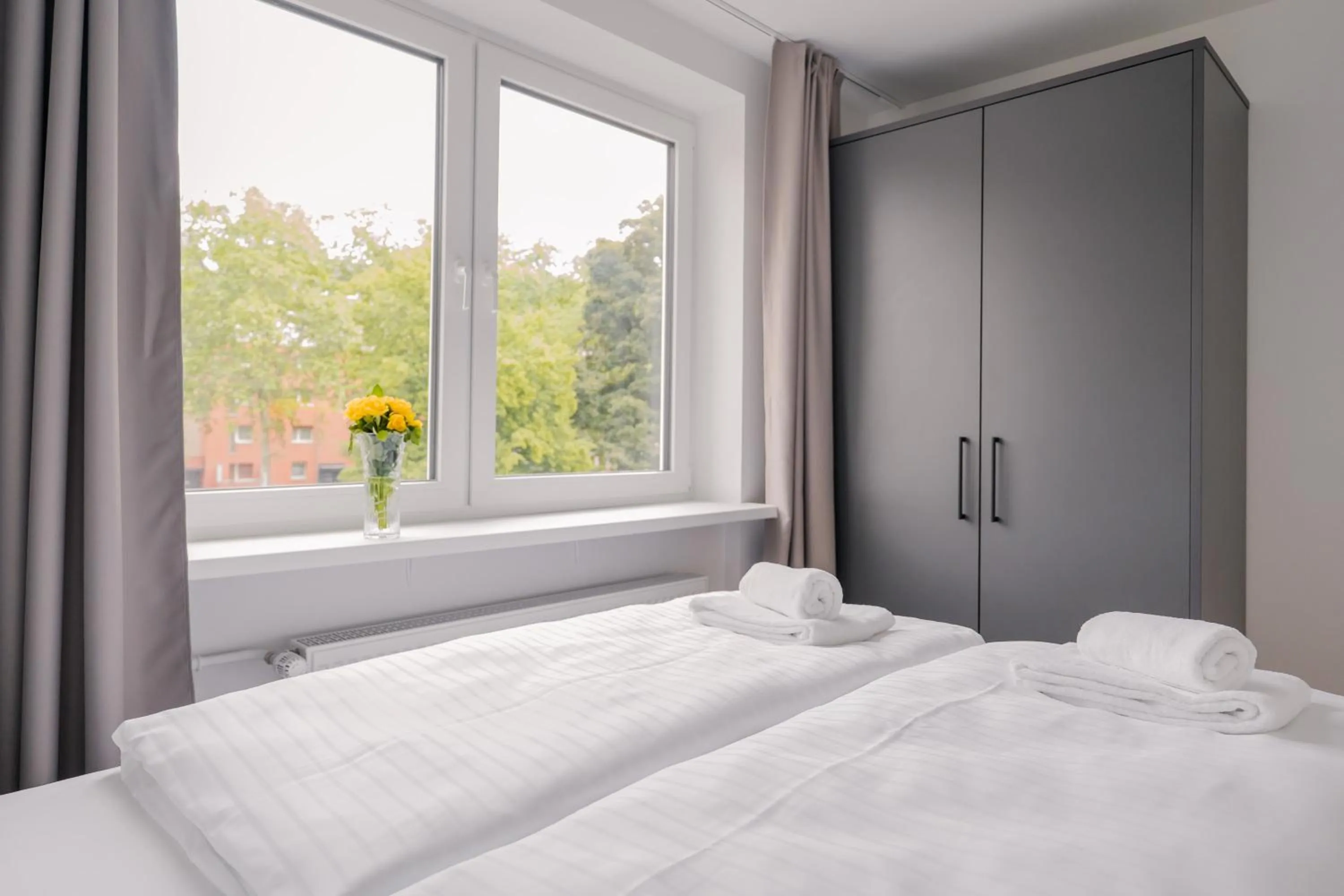 Bed in Homaris Apartments Nibelungen