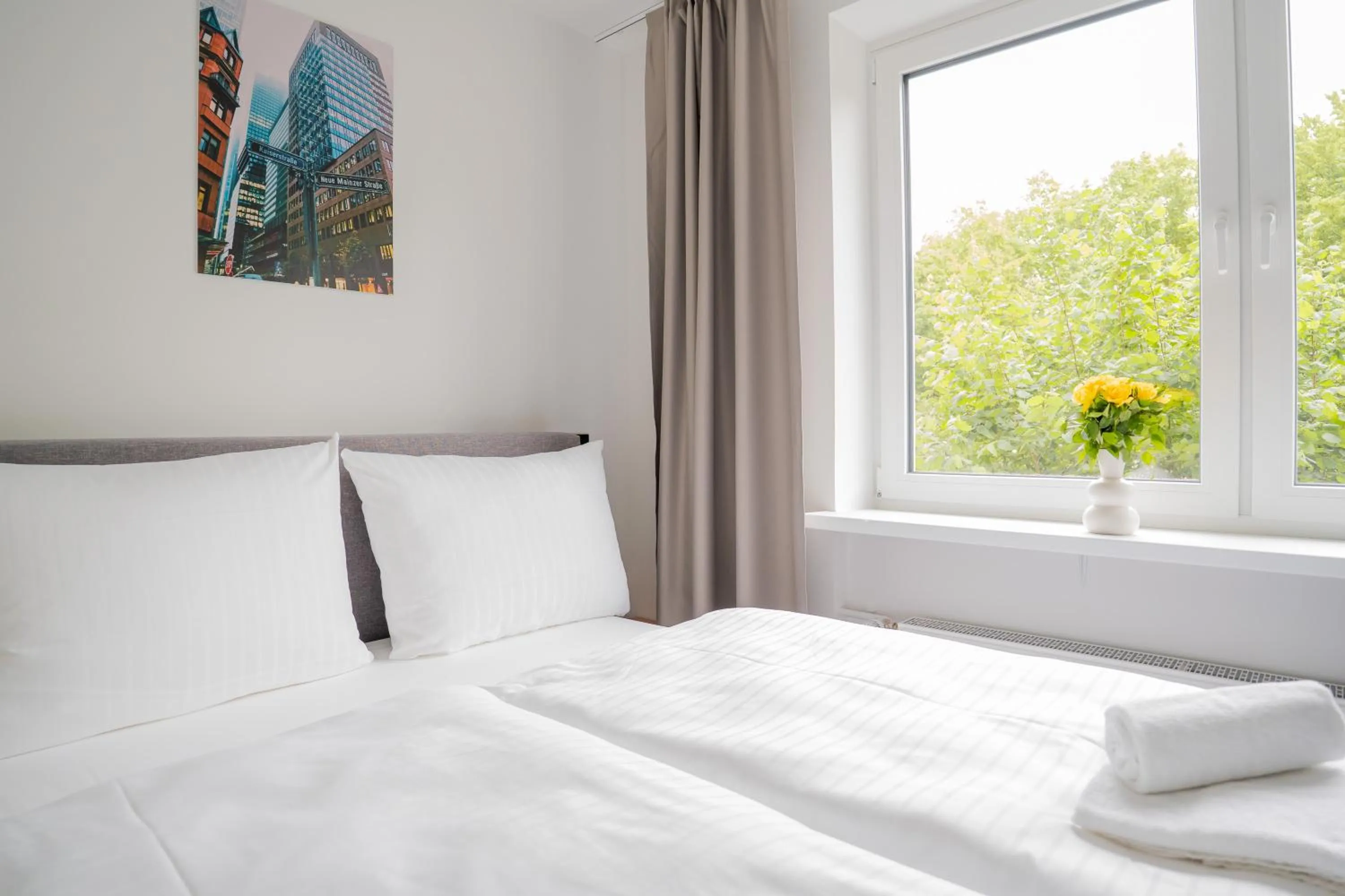 Bed in Homaris Apartments Nibelungen