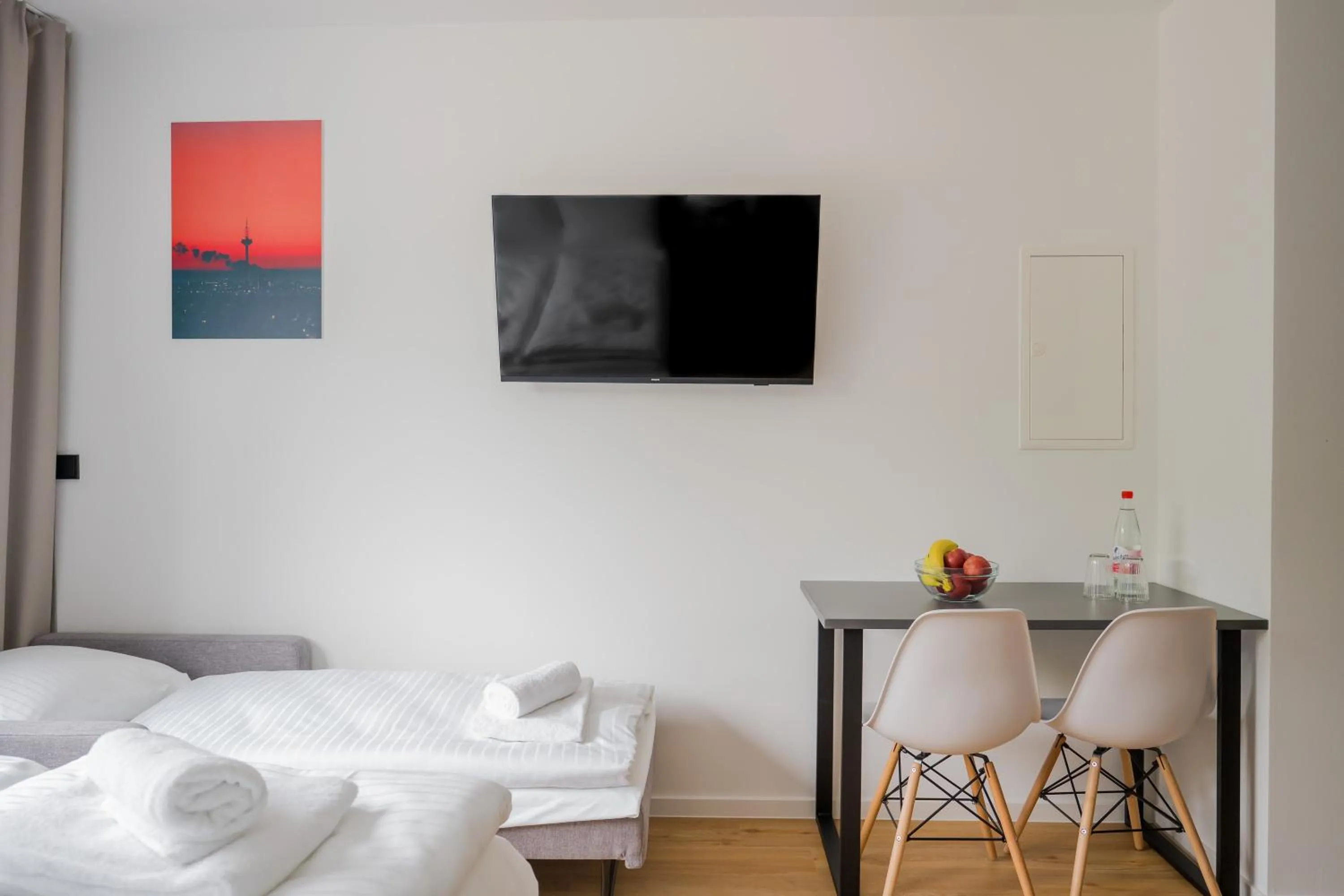 Bed in Homaris Apartments Nibelungen