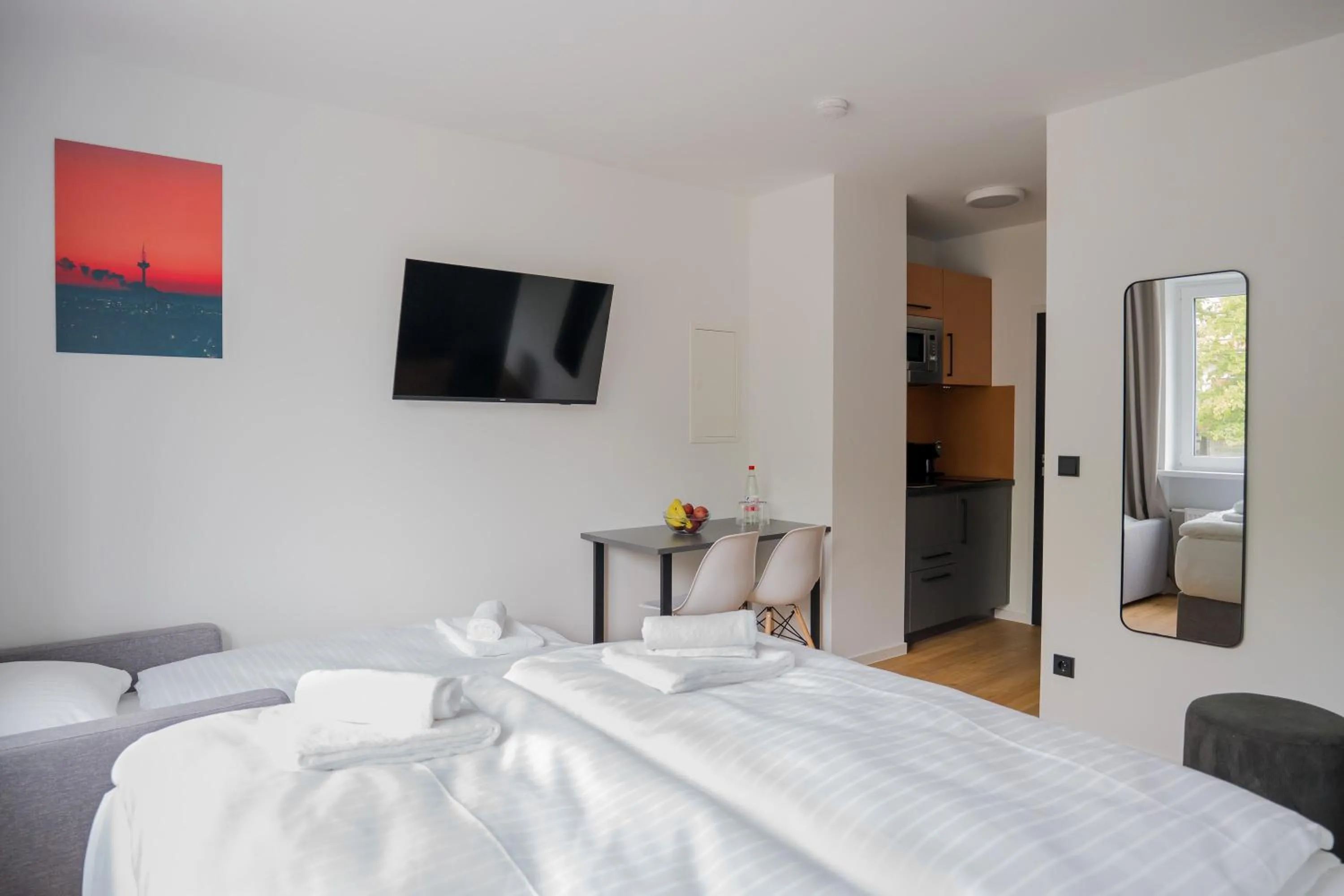 Bed in Homaris Apartments Nibelungen