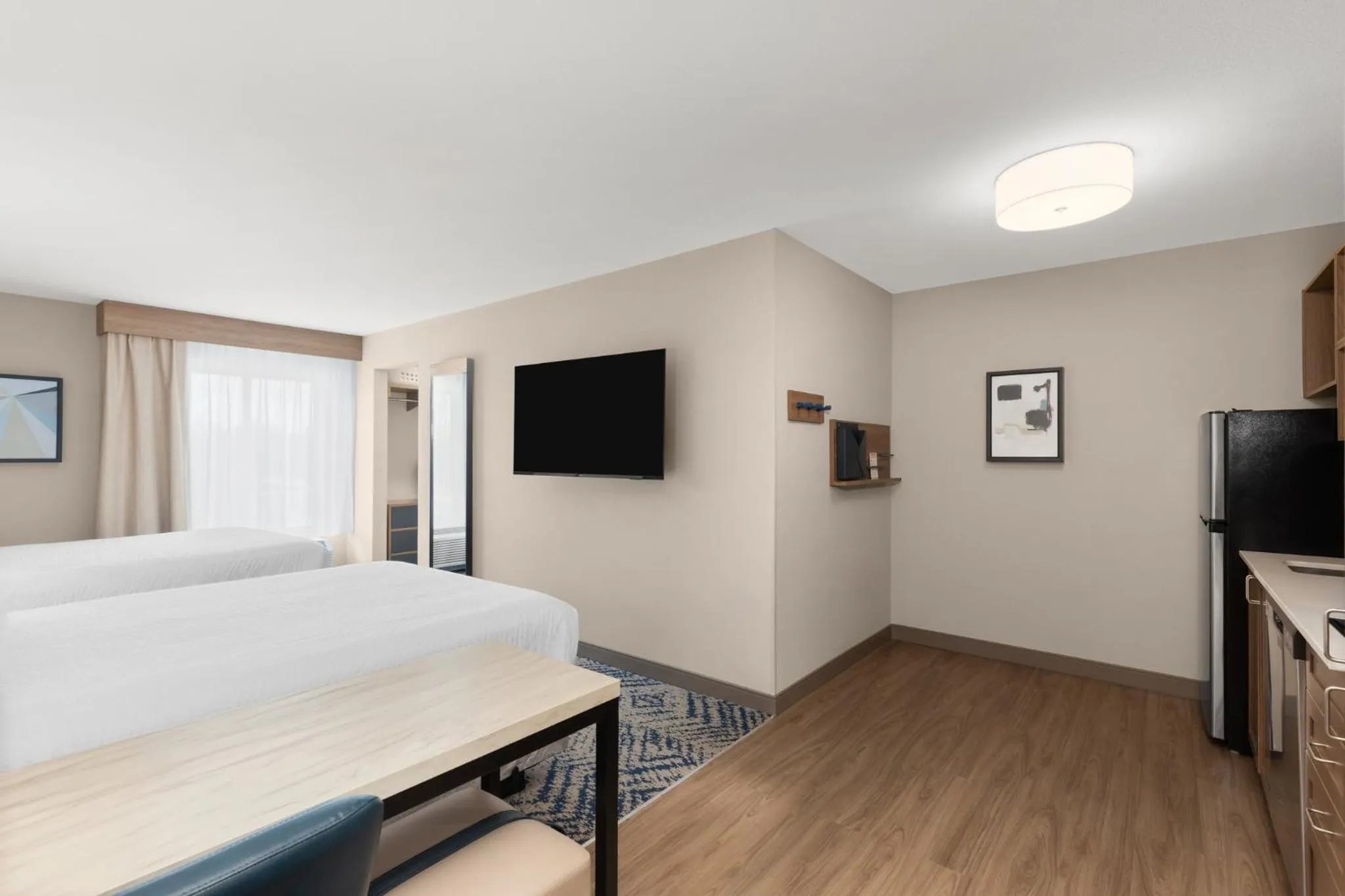 Photo of the whole room, Bed in Candlewood Suites Huntsville - Research Park by IHG