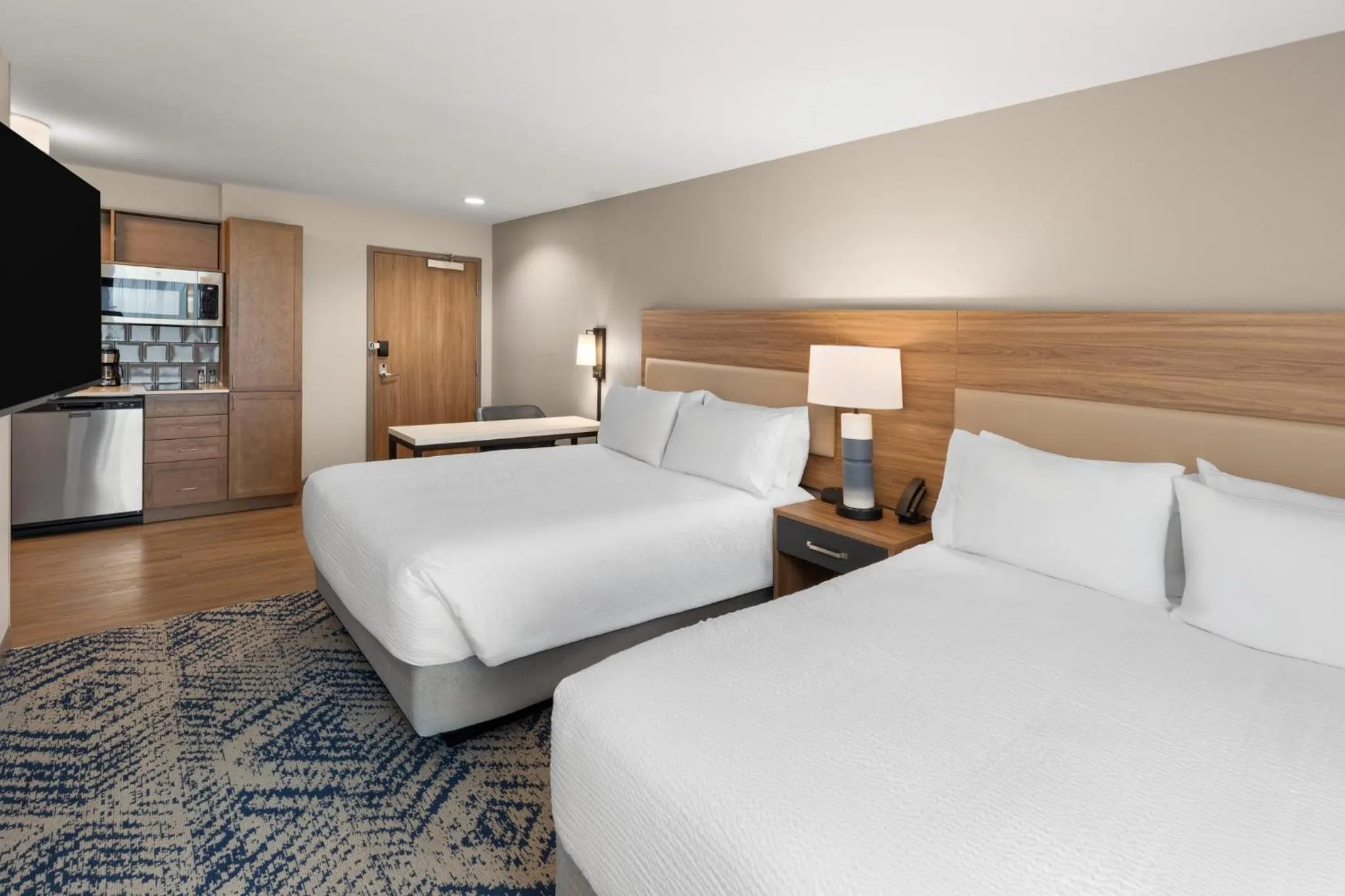 Photo of the whole room, Bed in Candlewood Suites Huntsville - Research Park by IHG