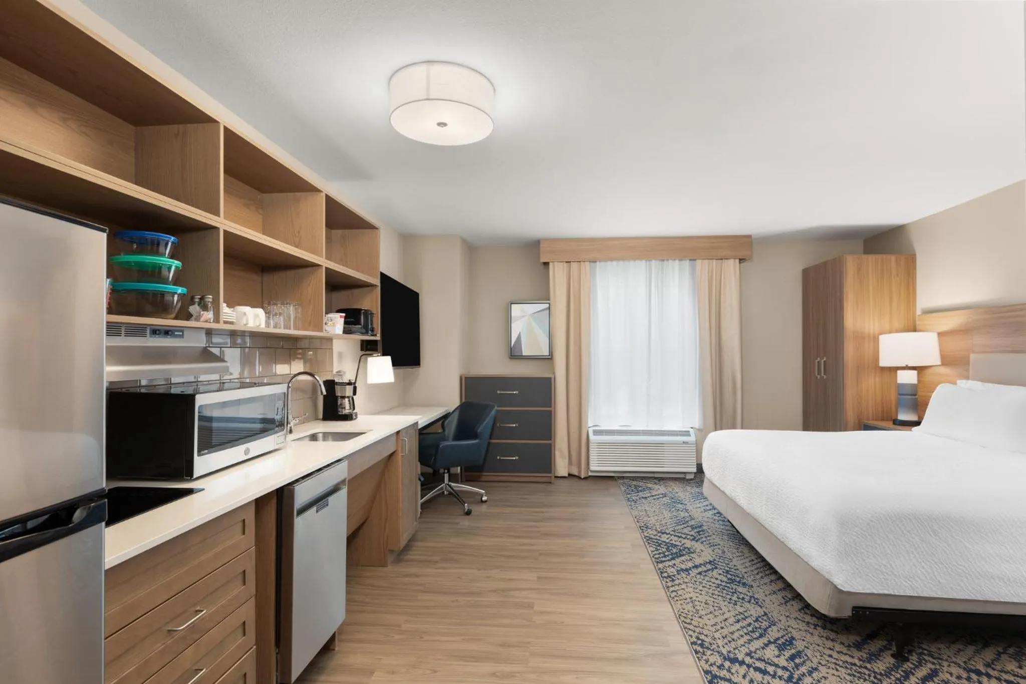 Photo of the whole room, Bed in Candlewood Suites Huntsville - Research Park by IHG