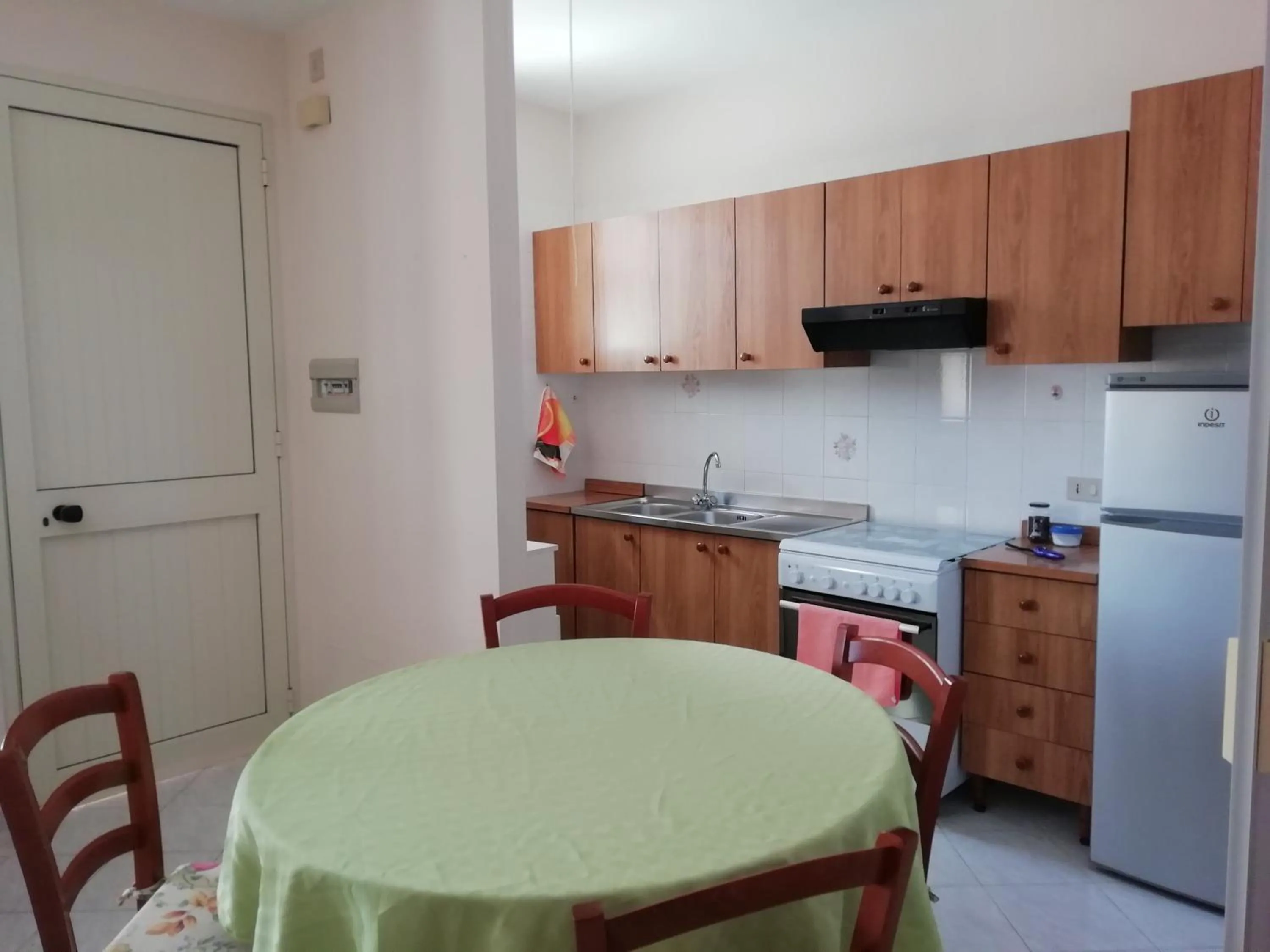 Kitchen or kitchenette in Stella di Mare Appartamenti