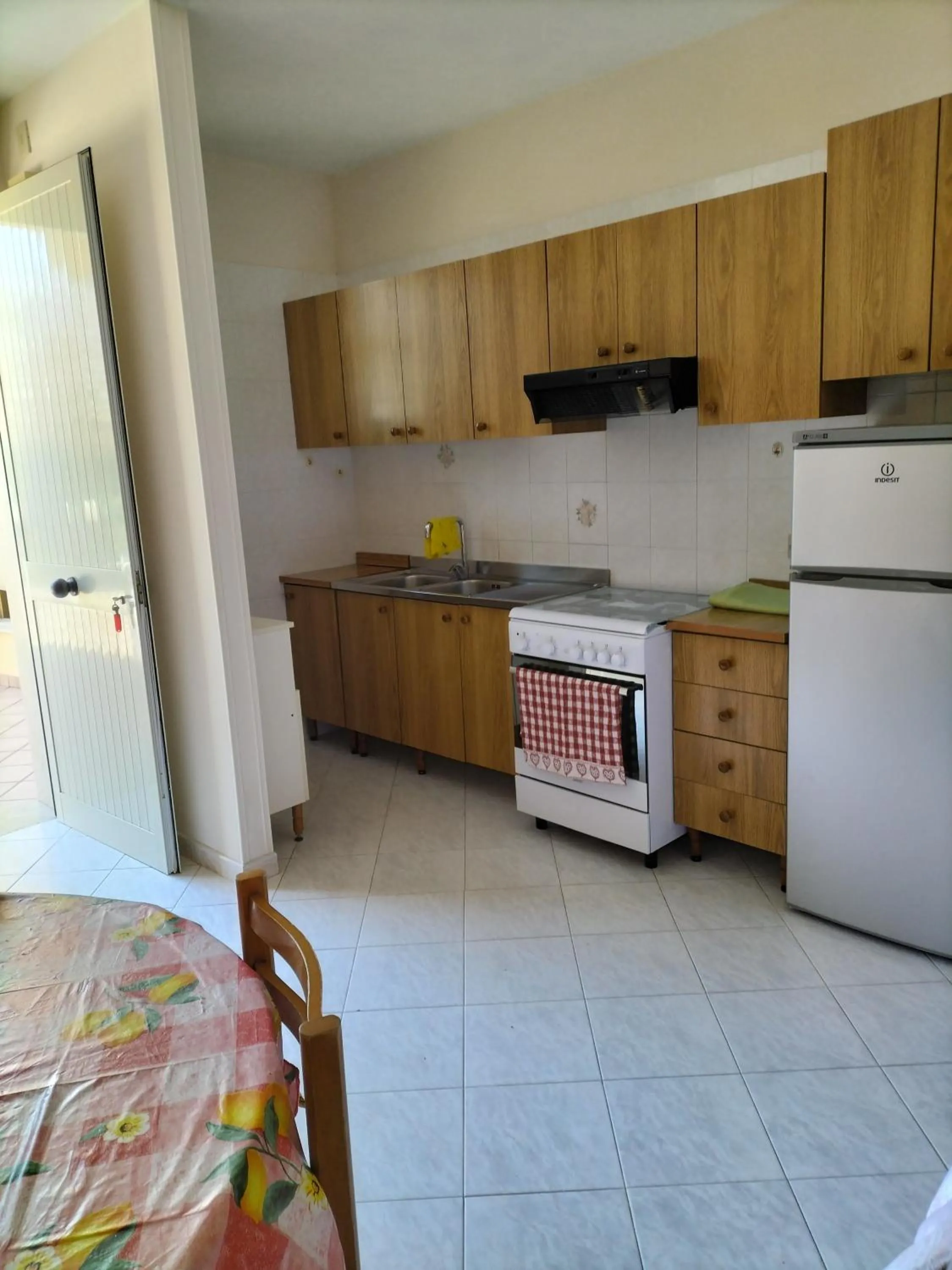 Kitchen or kitchenette in Stella di Mare Appartamenti