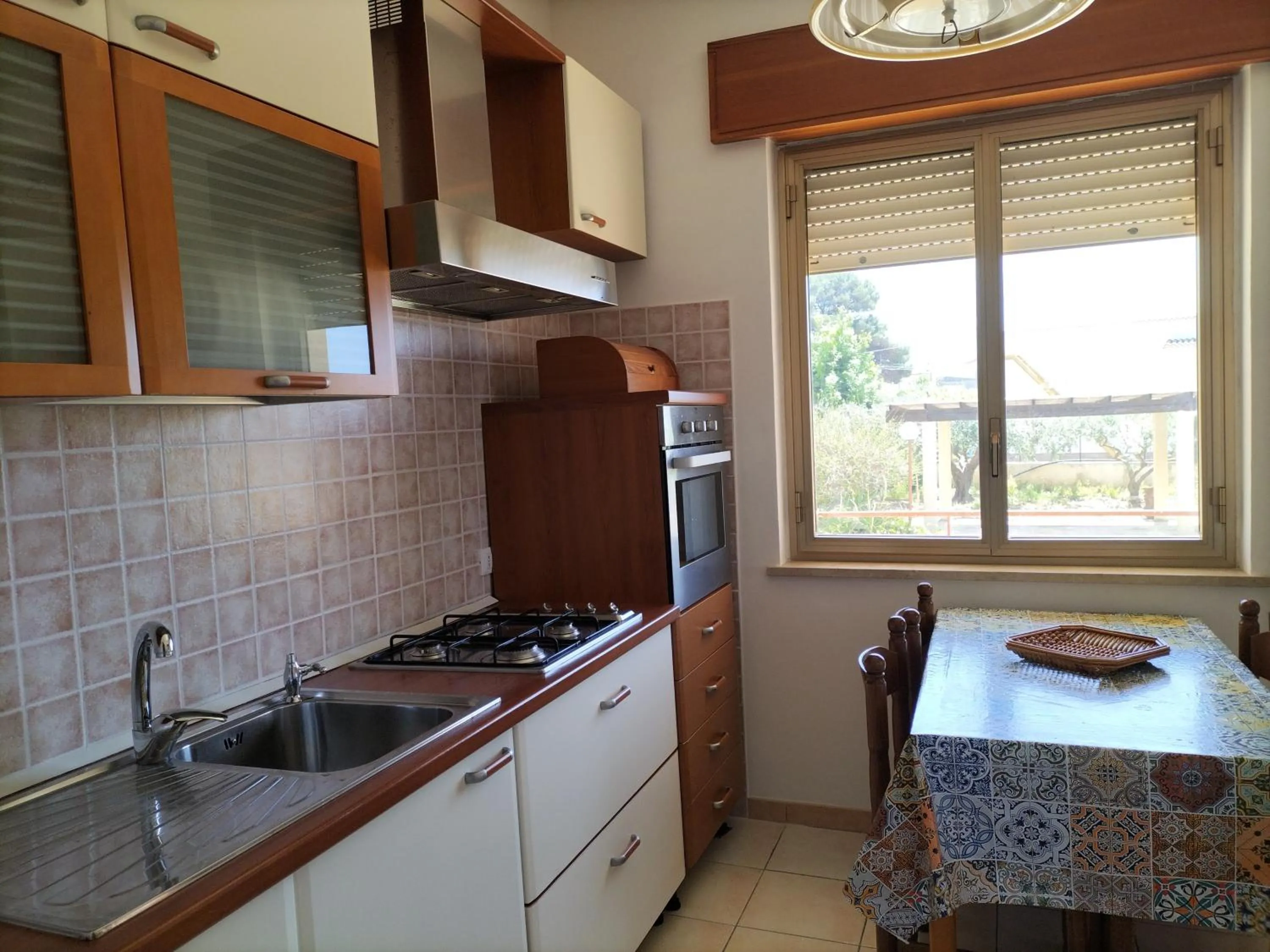 Kitchen or kitchenette in Stella di Mare Appartamenti