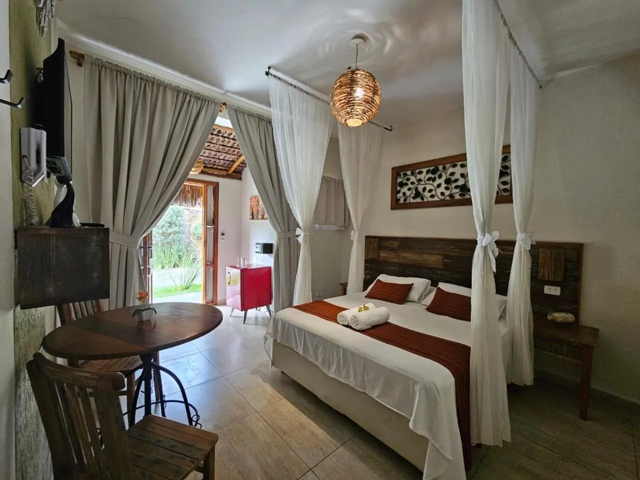 Bed in Pousada de Charme Emirados