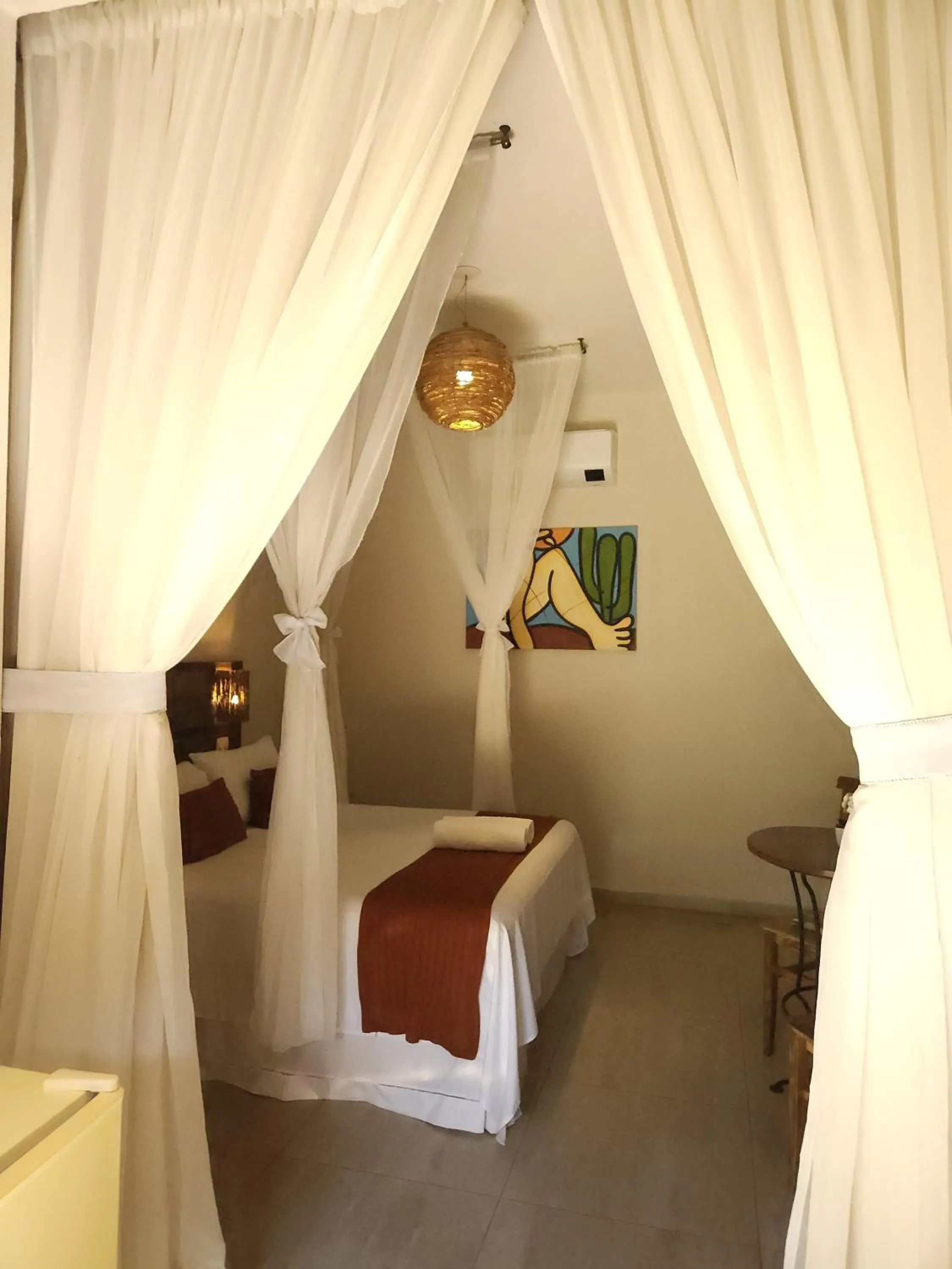 Bed in Pousada de Charme Emirados