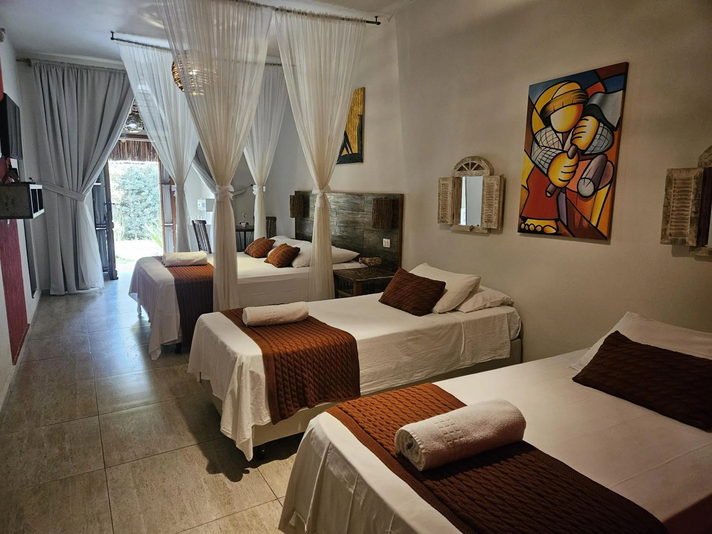 Bed in Pousada de Charme Emirados