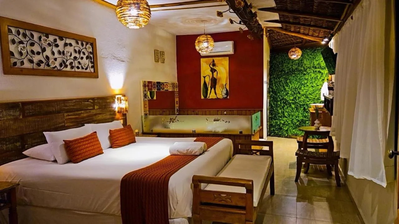 Bed in Pousada de Charme Emirados