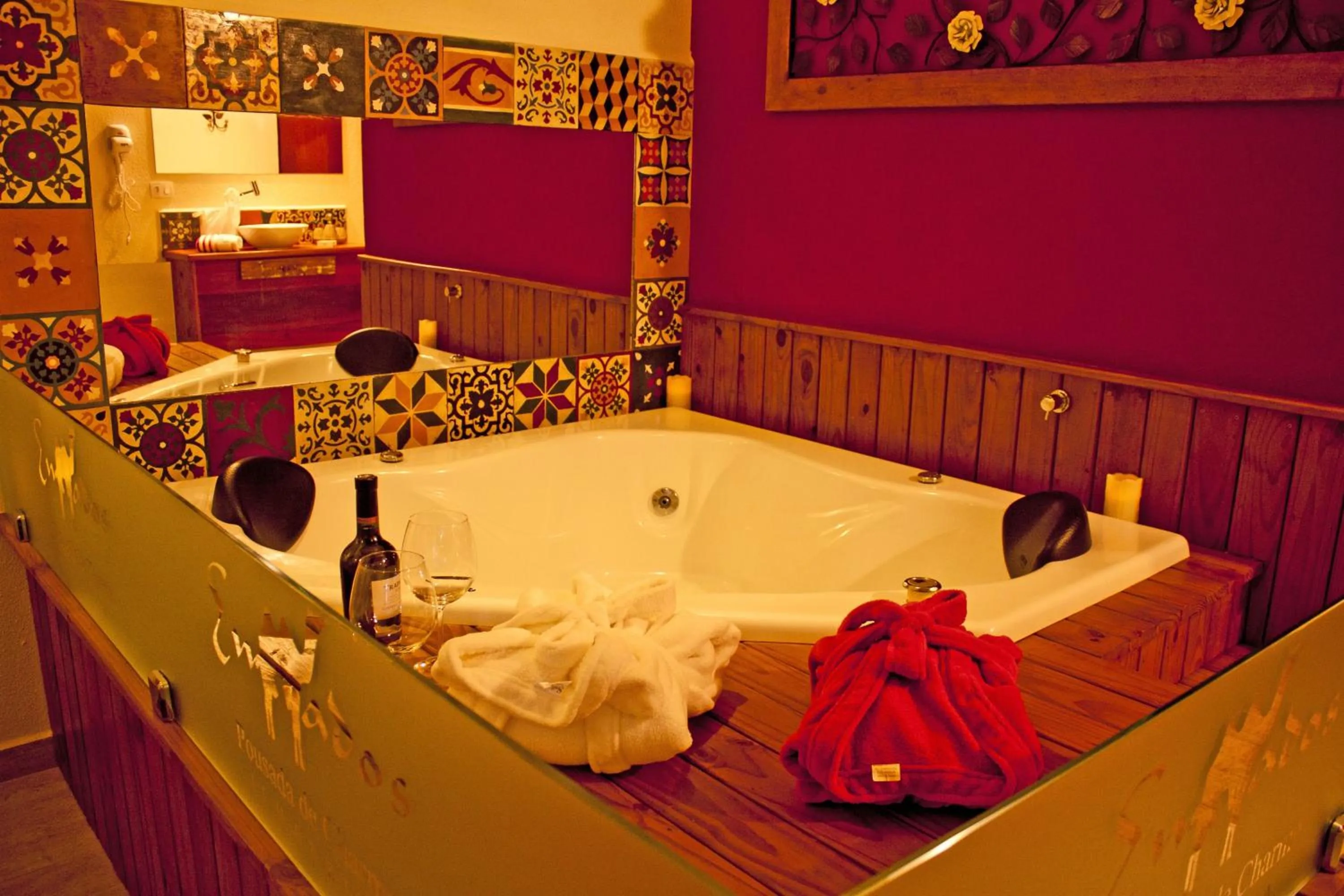 Bed in Pousada de Charme Emirados