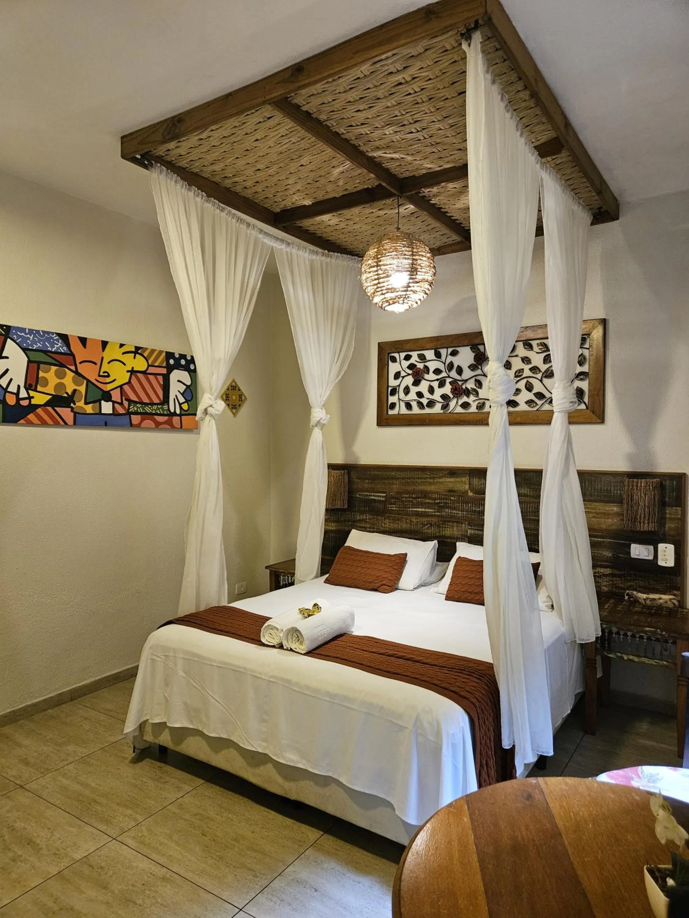 Bed in Pousada de Charme Emirados